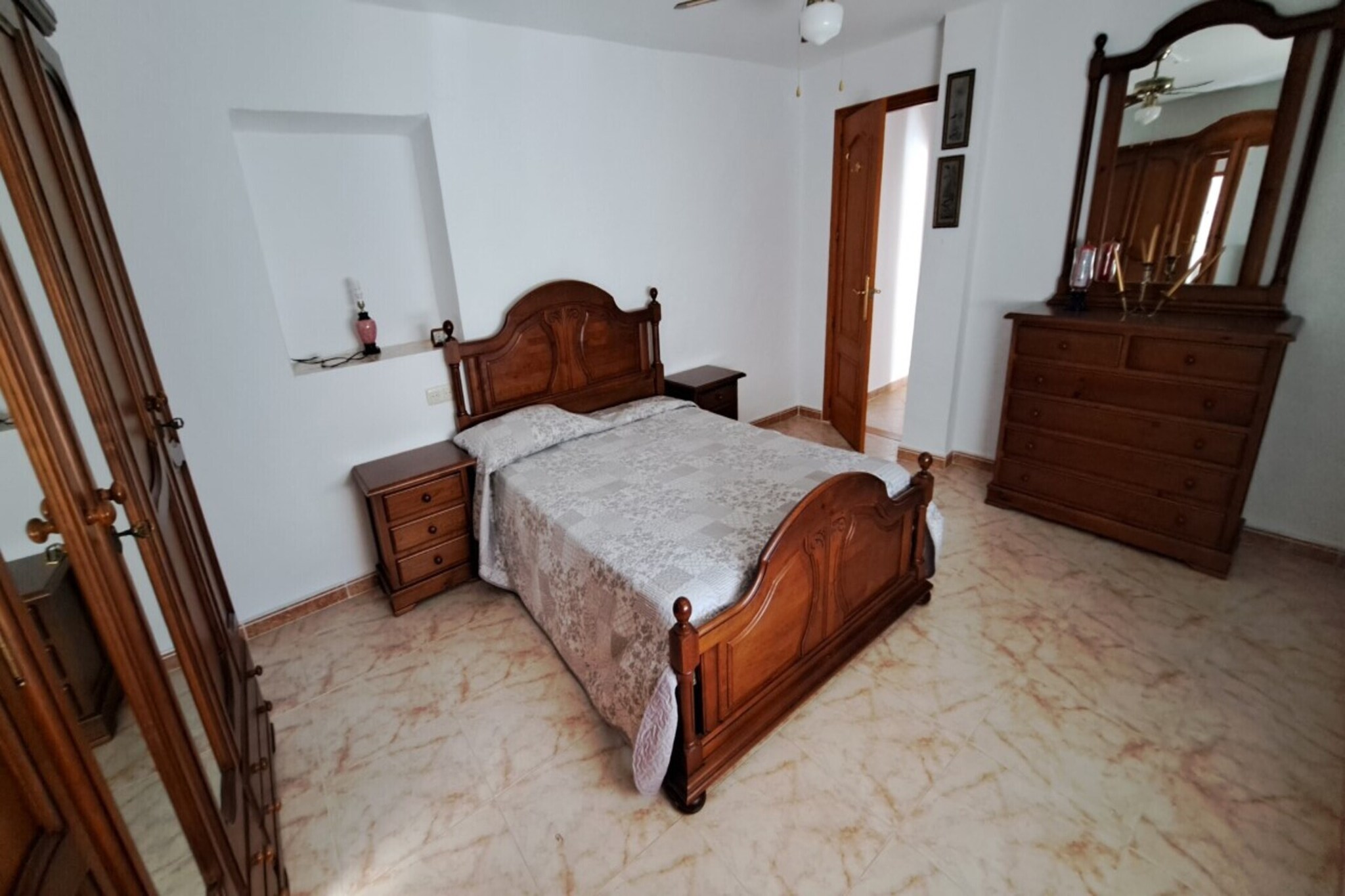 Ground floor: (Living room(TV, seating area, bar, gas fireplace), Kitchen(dining table, hob, electric kettle, toaster, hood, coffee machine, oven, microwave, dishwasher, fridge-freezer, washing machine, Hand blender), bedroom(small double bed, gas fireplace), bedroom(small double bed), bedroom(single sofa bed, single sofa bed), bathroom(shower, washbasin, toilet, bidet), bathroom(shower, washbasin, toilet))\n\ncot, balcony or terrace, garden, garden furniture, BBQ, parking, private indoor pool