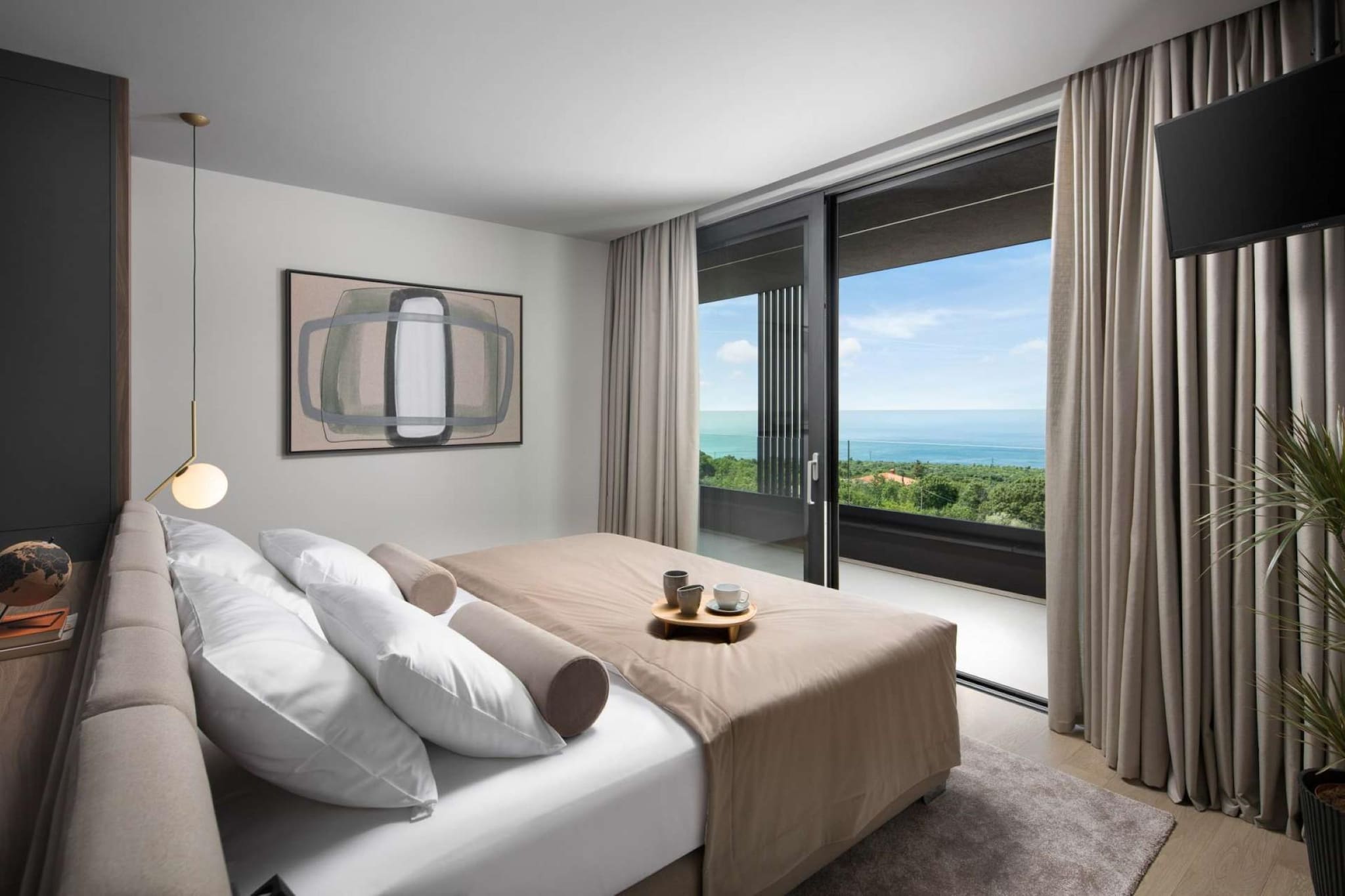 This elegant villa in Rabac, Istria is perfect for large families or groups. It features a private indoor pool, a covered terrace for morning coffee, and a peaceful garden for outdoor meals and relaxation. Inside, guests can unwind in the sauna or stay active with fitness equipment, ideal for recharging after a day at the beach.

The sea is just 1 km away, while restaurants and a supermarket are 14 km from the property. The villa includes both indoor and outdoor kitchens, perfect for preparing meals to enjoy with loved ones. A wireless music system and streaming service ensure entertainment throughout your stay.

Free on-site parking keeps your vehicle secure. Whether you're swimming, grilling, or relaxing indoors, this villa offers a perfect blend of comfort, wellness, and coastal charm for a memorable Istrian escape.