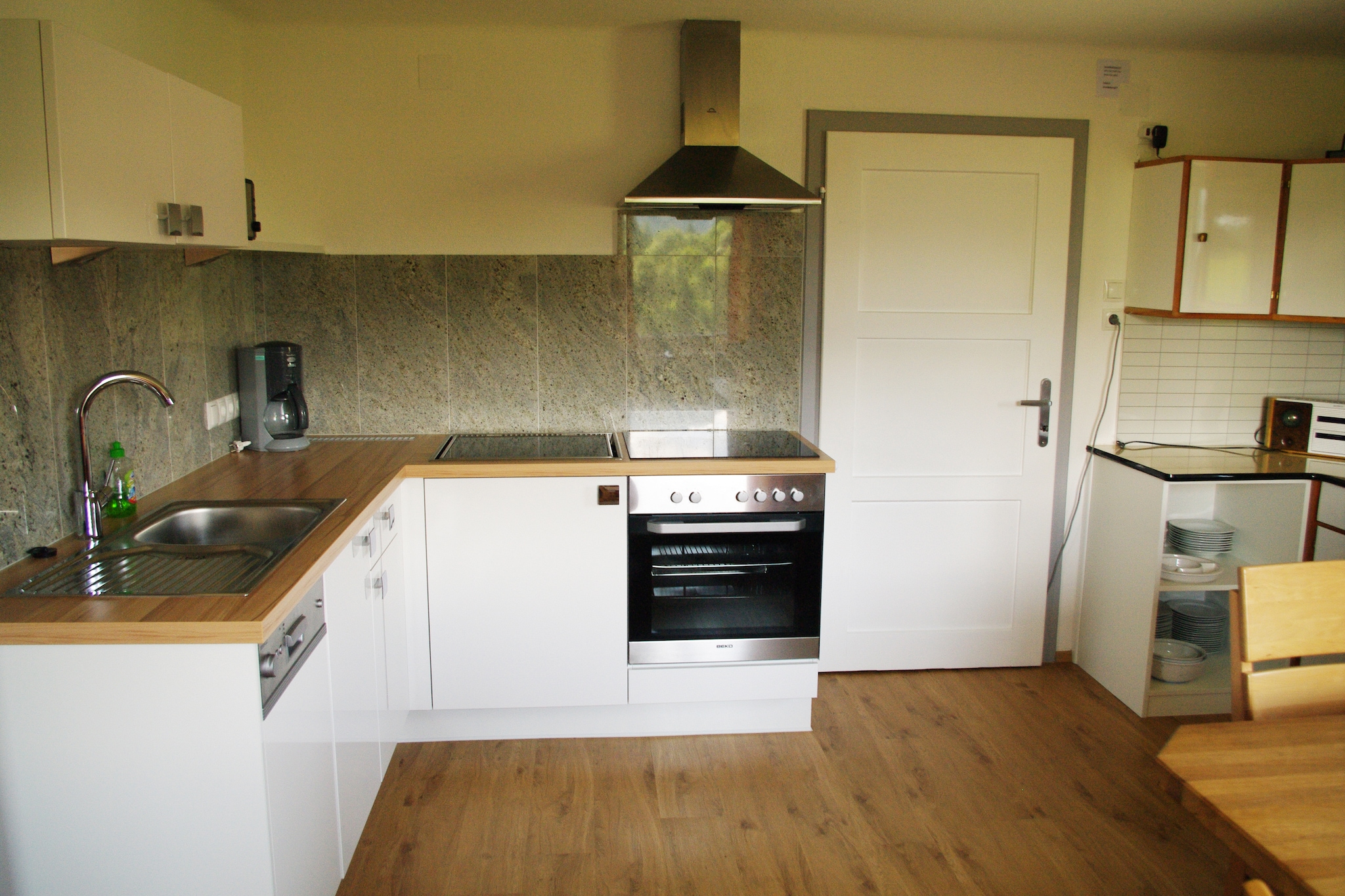 Ground floor: (Entrance, Living room(TV, seating area), Kitchen(dining table, electric kettle, cooker, coffee machine, oven, microwave, dishwasher, fridge-freezer), bathroom(bath tub, shower), toilet, relaxation area(bunk bed, bunk bed))\n\nOn the 1st floor: (hall(washbasin), bedroom(single bed, double bed, washbasin), bedroom(single bed, double bed, TV), bedroom(double bed, washbasin), bedroom(bunk bed), conservatory/veranda)\n\nBasement: (washing room, storage, ski storage, bicycle storage, bicycle storage)\n\nsauna(private), terrace, garden, garden furniture, BBQ, parking