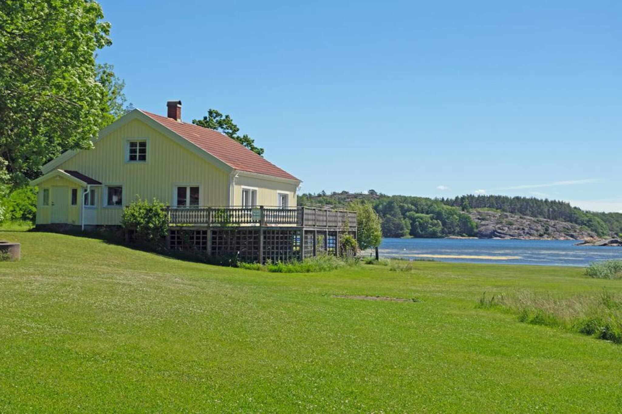 Cottage en bord de mer avec balcon et barbecue