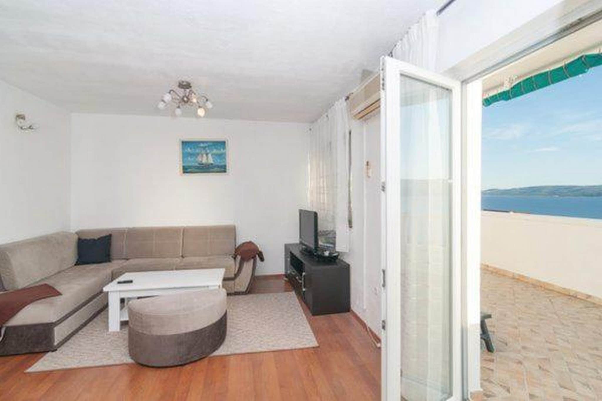 Apartment Stipic Omis is located in Omiš, a small Central Dalmatian town and harbour located between Split and Makarska.
Spacious roof-top terrace fitted with outdoor furniture and BBQ facilities are at your disposal, which makes this place ideal for a nice and relaxing family or friends vacation.
Free private parking is provided.
Luggage storage is possible prior to check in and after check out.
Baby cot is available upon request.
This lovely three bedroom apartment with terrace is perfectly fit for up to eight people. It features free WIFI, air conditioning as well as SAT LCD TV. The open space living
room comes with sofa and sitting area, and it's combined with the equipped kitchen and dining area. The private bathroom comes with shower and toilet.
Free toiletries (shampoo, soap and toilet paper), hair dryer as well as linens and towels are at your disposal.
If you want to spend your vacation in a peaceful and quiet environment, far from the city crowds, and also to have nearby all you need during your holidays, Apartment Stipic Omis is
the best choice for you. In the neighborhood you can find market, bus station, restaurants and café bar only 200 m away.
The nearest beach is only 300 m away.
The nearest bus station is located 200 m away from the property Apartment Stipic Omis while the airport is 15 km away.