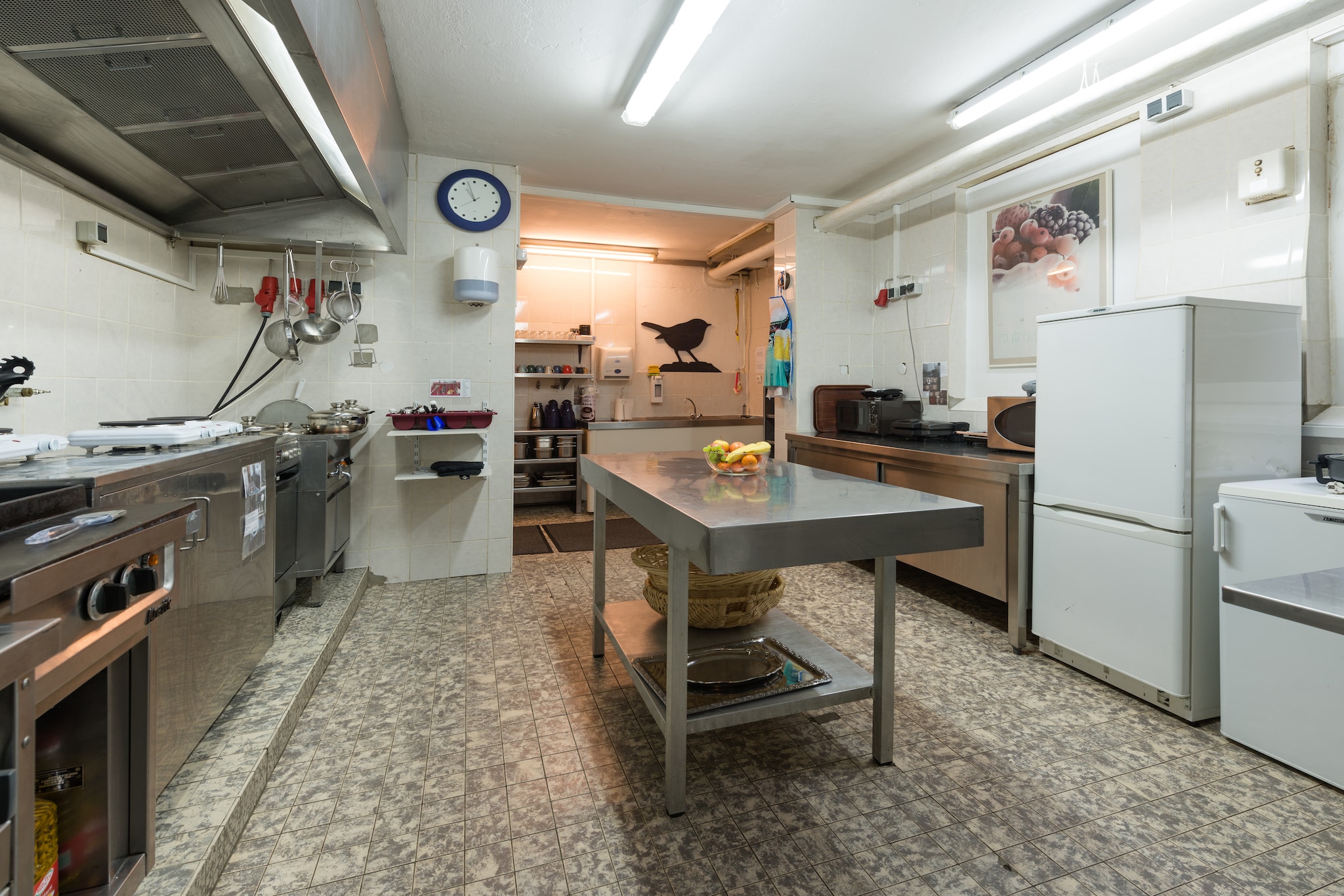 Ground floor: (dining room(bar), Kitchen(2x cooker(4 ring stoves, electric), 3x coffee machine, oven, microwave, dishwasher, fridge-freezer), toilet, toilet, shared room(TV, fireplace, radio, CD player), conservatory/veranda)\n\nOn the 1st floor: (Bedroom with bathroom(double bed, shower, washbasin, toilet, balcony), Bedroom with bathroom(double bed, shower, washbasin, toilet, balcony), Bedroom with bathroom(double bed(140 x 200 cm), shower, washbasin, toilet, balcony), Bedroom with bathroom(single bed, single bed, double bed, shower, washbasin, toilet, balcony), Bedroom with bathroom(double bed, shower, washbasin, toilet), Bedroom with bathroom(double bed, shower, washbasin, toilet), Bedroom with bathroom(double bed(140 x 200 cm), shower, washbasin, toilet), Bedroom with bathroom(single bed, shower, washbasin, toilet))\n\nOn the 2nd floor: (Bedroom with bathroom(single bed, double bed, shower, washbasin, toilet), Bedroom with bathroom(double bed(140 x 200 cm), shower, washbasin, toilet), Bedroom with bathroom(double bed(140 x 200 cm), shower, washbasin, toilet), Bedroom with bathroom(double bed, shower, washbasin, toilet), Bedroom with bathroom(double bed, shower, washbasin, toilet), Bedroom with bathroom(double bed, shower, washbasin, toilet), Bedroom with bathroom(single bed, shower, washbasin, toilet))\n\nOn the 3rd floor: (Bedroom with bathroom(single bed, shower, washbasin, toilet), Bedroom with bathroom(single bed, shower, washbasin, toilet), Bedroom with bathroom(single bed, single bed, single bed, double bed, shower, washbasin, toilet), Bedroom with bathroom(single bed, double bed, shower, washbasin, toilet))\n\n2nd Guest house ground floor: (Entrance, Living room(TV, fireplace), Kitchen(electric kettle, toaster, cooker(4 ring stoves, induction), coffee machine(filter), oven, microwave, dishwasher, fridge-freezer), Living/diningroom, toilet(washbasin, toilet), toilet(washbasin, toilet), storage(fridge, freezer))\n\n2nd Guest house on the 1st floor: (bedroom(single bed), bedroom(single bed, single bed), bedroom(single bed, single bed), bedroom(double bed(180 x 200 cm)), bedroom(single bed, double bed(180 x 200 cm)), bathroom(shower, washbasin, toilet), bathroom(shower, washbasin, toilet))\n\nbalcony, heating(central, gas), terrace(private), terrace, garden, garden furniture, BBQ(charcoal), parking, pond, high chair, Sunscreen