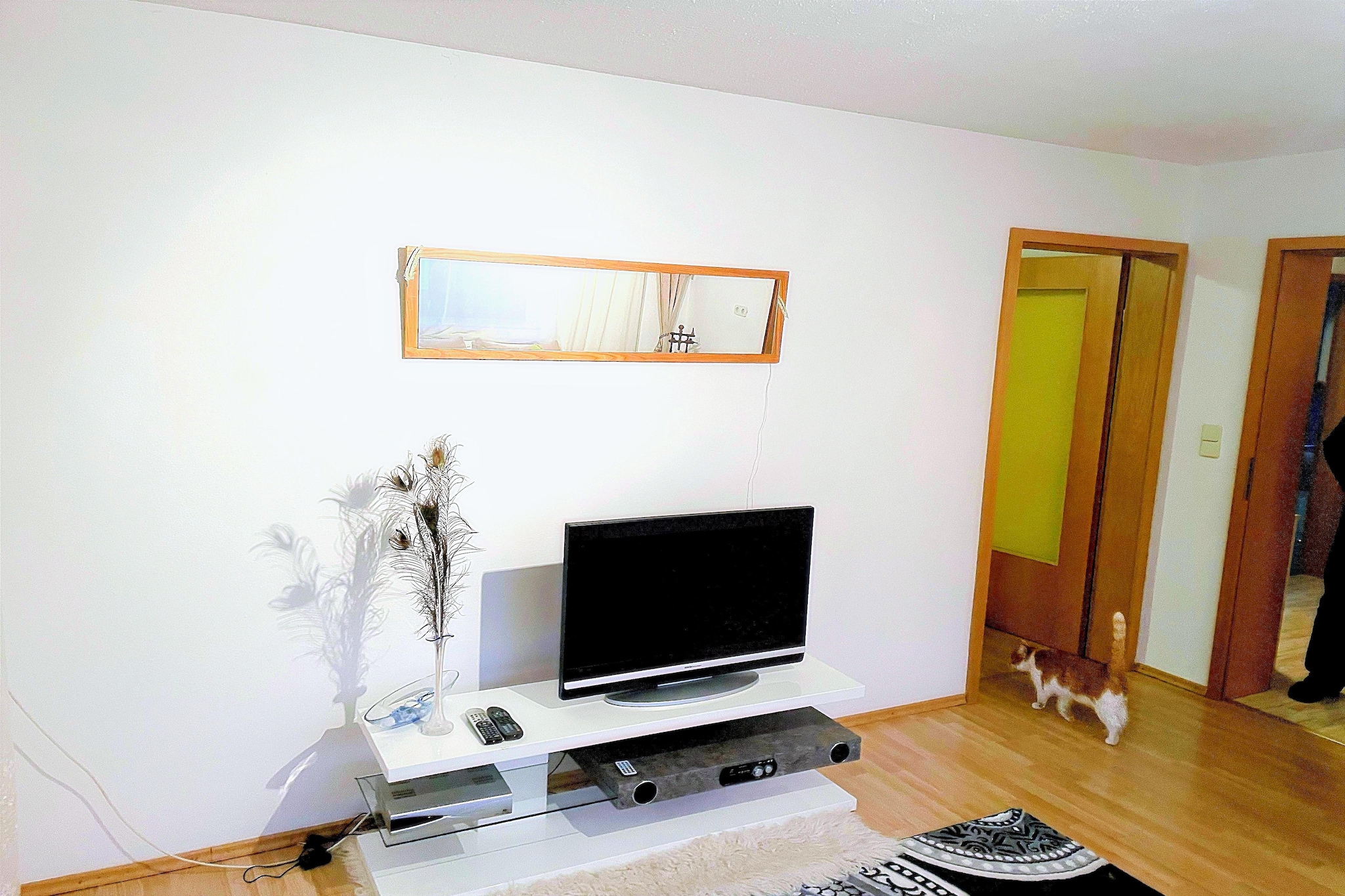 On the 1st floor: (hallway, Kitchen(hob, electric kettle, toaster, wood cooker, cooker, hood, coffee machine, oven, fridge, freezer), Living/bed room(double sofa bed, TV, fireplace, DVD player, radio), bedroom(double bed), bedroom(double bed), bathroom(bathtub with shower, washbasin), toilet)\n\ngrill, balcony or terrace, garden, parking