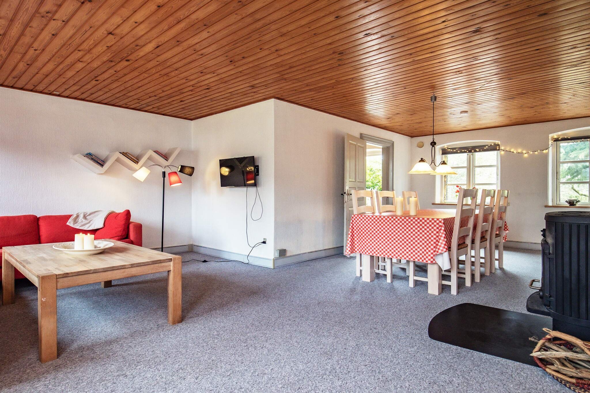 Kitchen(cooker(electric), coffee machine, dishwasher, fridge, freezer(1-59L), washing machine), Living/bed room(TV, chromecast), bedroom(double bed), bedroom(2x bunk bed), bedroom(2x single bed), bathroom(washbasin, shower, toilet), balcony or terrace, garden furniture, play equipment