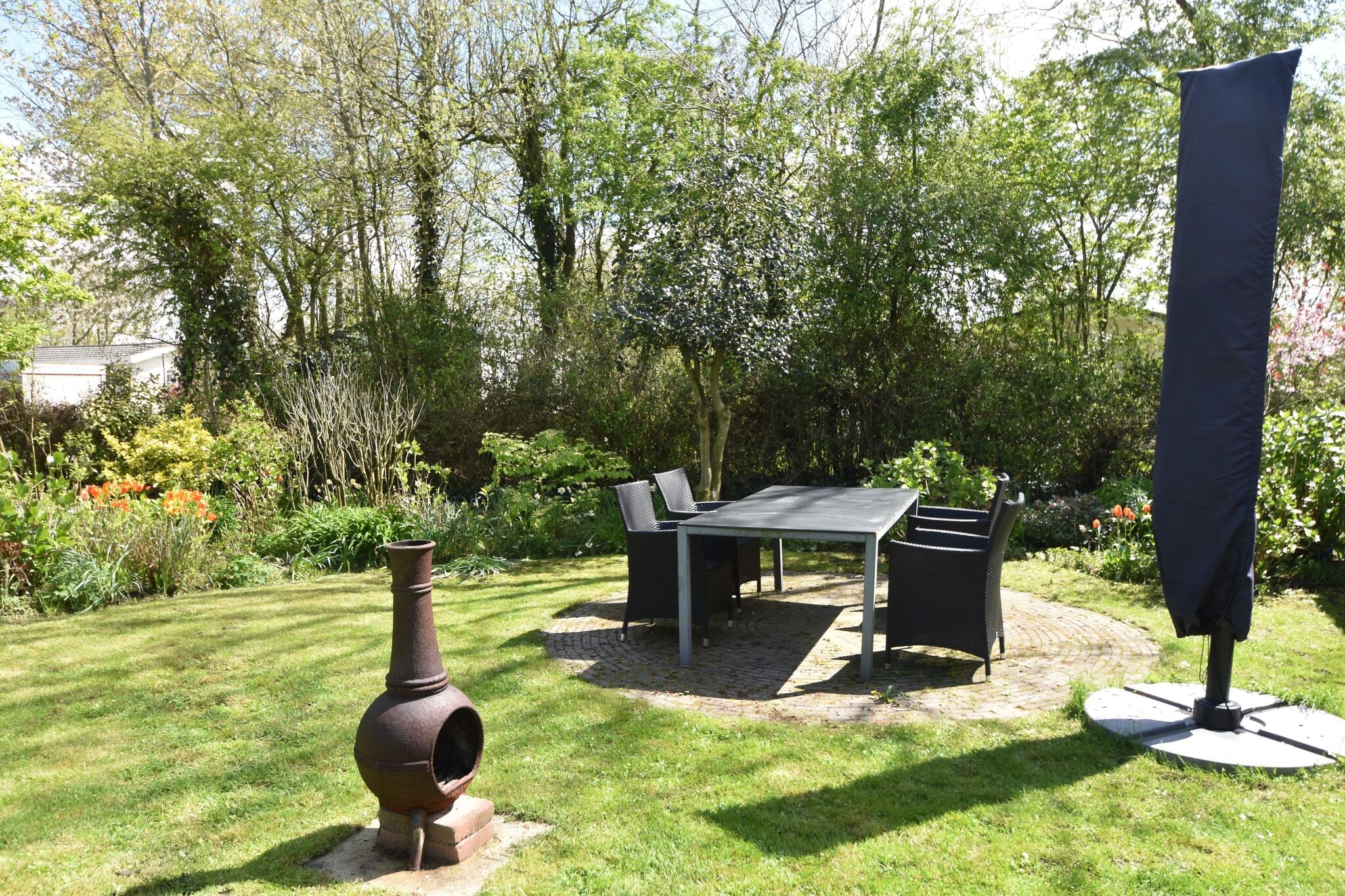 Holiday home with garden and barbecue