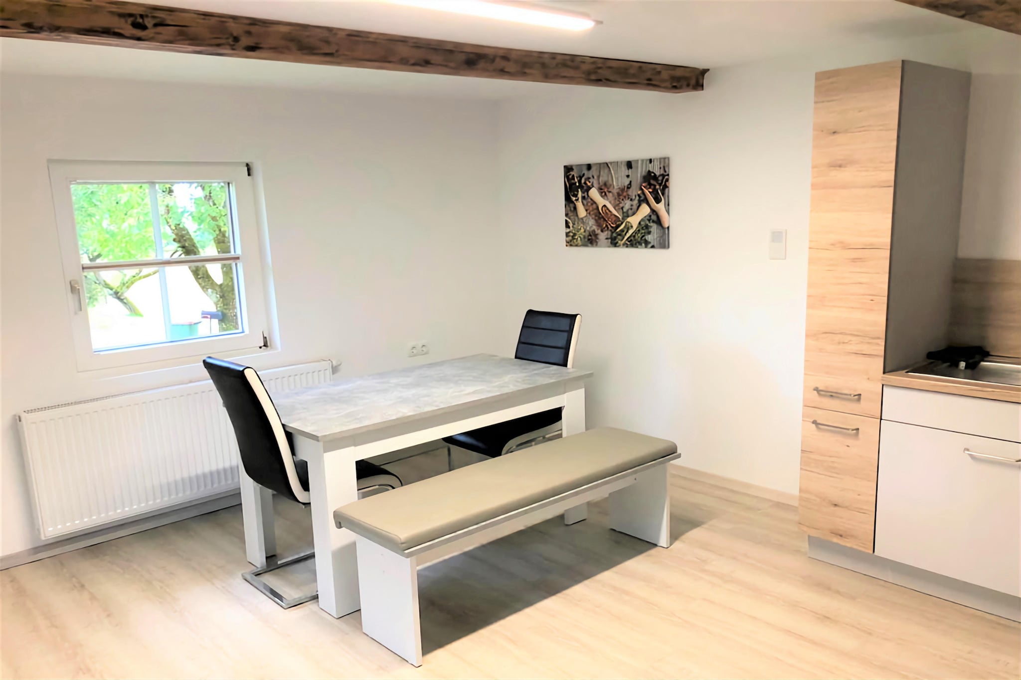 Ground floor: (hallway, Living room(double sofa bed, TV), open kitchen(stove, electric kettle, toaster, coffee machine, oven, microwave, dishwasher, fridge, freezer), bedroom(double bed), bathroom(shower, washbasin), storage(washing machine))\n\nseating area, grill, terrace, parking, outdoor fireplace