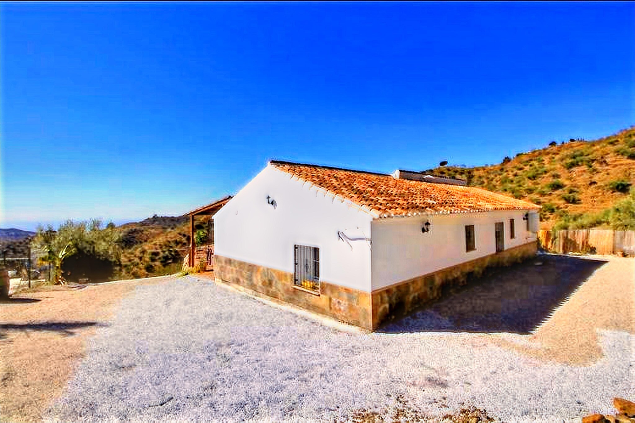 Stay in this wonderful farm located very close to the town of Arenas, surrounded by nature. The home is ideal for a vacation with family. Of course, it is worth noting its large outdoor areas together with the large pool where you can enjoy wonderful evenings. 
There are many interesting tourist attractions worth visiting here. Enjoy the delicacies of the region in the restaurants located nearby. You can also fill the pantry from the supermarket for the stay. 
The home has 3 bedrooms and two fully equipped bathrooms. The kitchen with everything you need to make your stay as pleasant as possible. The air conditioning ensures the house remains cool in summer. Enjoy barbecue meals in the garden with your pals. The parking facility ensures that your cars are parked safely. 
About Belvilla:
When you stay in a Belvilla home, you can rest assured of a unique holiday home in ideal surroundings at an attractive price. The portfolio of accommodations consists of more than 40,000-holiday homes in 20 European countries. Interested in a weekend getaway, a summer or winter sports holiday, or simply a short break? Do you prefer the coast, the countryside or the mountains? Whatever your preference, there is a Belvilla home to meet your needs, from a cosy gîte for two to a castle big enough for the entire family, from an apartment in the heart of Rome to a cabin in the middle of nowhere, from a simple tree house to a luxury dream villa and from close to home to the other side of Europe.
A Belvilla home gives you the freedom to enjoy breakfast in your pyjamas or continue a good conversation into the morning hours without having to worry about the bar's closing time. Prepare gourmet meals with fresh local ingredients in your own kitchen and take advantage of having your own swimming pool to do as many cannonballs as you want! In other words, you can enjoy complete privacy in your home away from home.