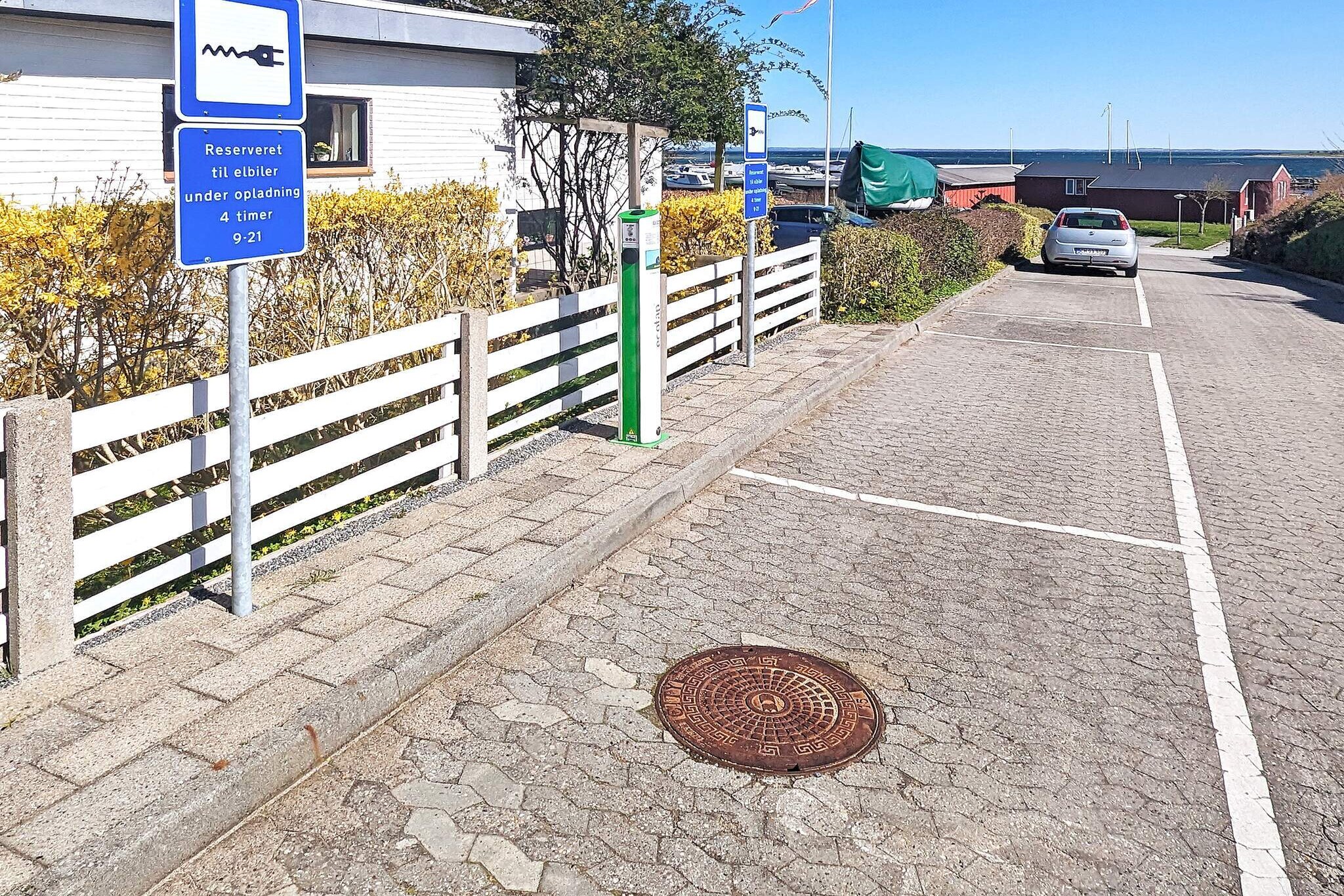 This charming terraced house is located just 50 meters from the marina in Ærøskøbing. The property is part of Ærø Marina, a complex consisting of 37 townhouses, and was renovated in 2015. Brightly decorated in light tones, the house provides a modern yet cozy setting for a relaxing holiday by the water. Its central location makes it a great choice for guests who want both comfort and easy access to local attractions. Right outside the door, the harbor offers fun activities such as mini golf and a playground, making it especially appealing for families with children. For those wishing to explore the town, the charming center of Ærøskøbing is only about 200 meters away and can be reached by following the footpaths. Alternatively, you can enjoy a leisurely stroll along the marina, where you can watch the ferry arrive and soak in the maritime atmosphere. The house combines the convenience of being close to shopping, dining, and cultural sights with the tranquility of a waterfront setting. Whether you are looking for a peaceful coastal retreat, a family-friendly holiday base, or a cozy place to enjoy the charm of Ærø, this townhouse offers an ideal balance. Please note that rental to youth groups is not permitted.A refundable deposit might be charged closer to your check-in date. The security deposit ensures a smooth stay and covers any additional services or consumption charges.This deposit covers utilities consumed during your stay and any additional services that may be taken.The final amount will be adjusted based on actual meter readings, actual usage of extra services, and any remaining balance will be refunded within 21 days after checkout.This deposit simply acts as a prepayment for charges that  you would anyways pay for, ensuring a seamless stay and check-out experience.