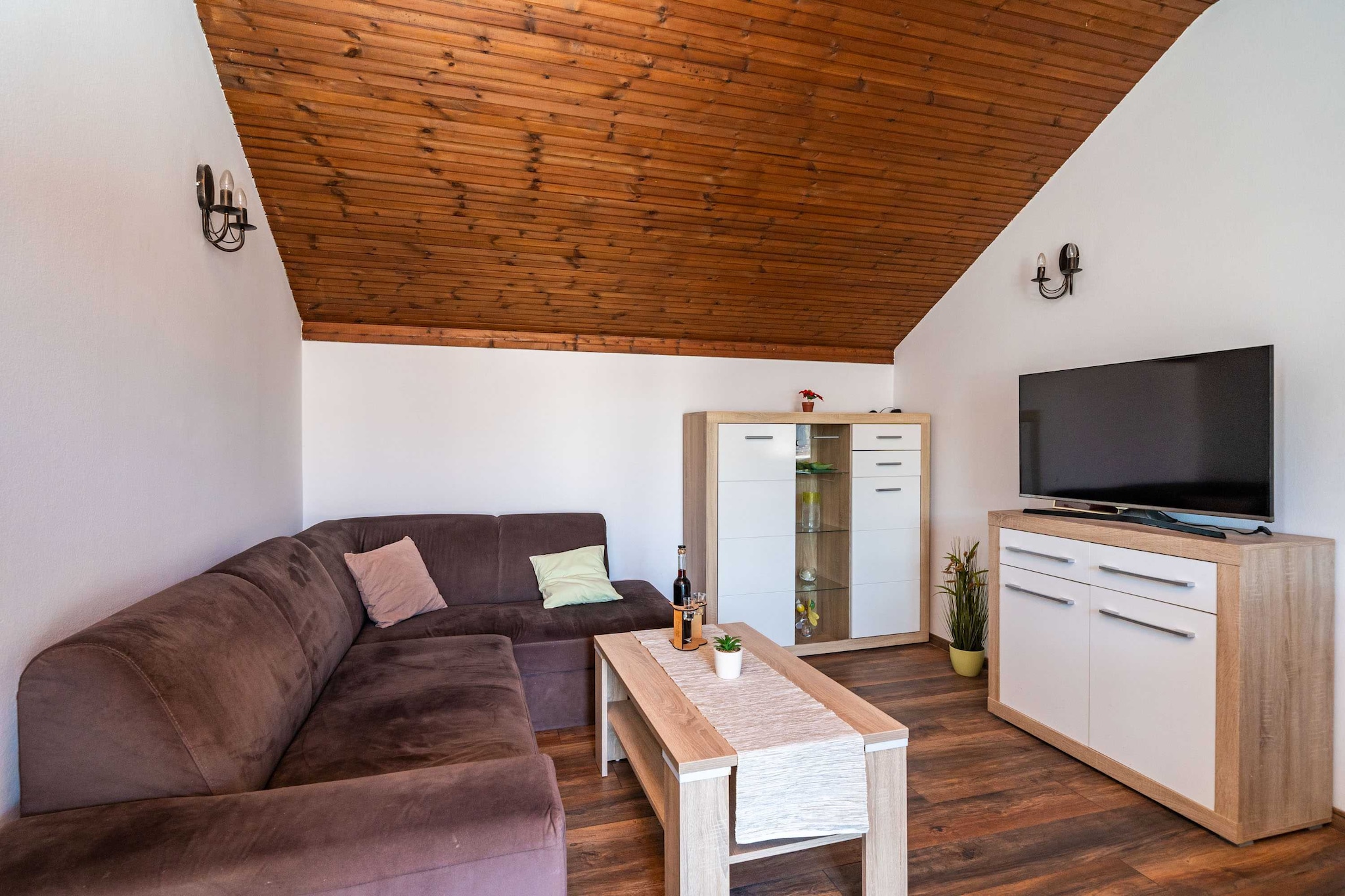 On the 2nd floor: (Living room, Kitchen, bedroom(double bed), bathroom(toilet, shower, bidet))\n\ndining room, TV, dining table, stove, seating area, electric kettle, toaster, coffee machine, oven, microwave, fridge, freezer, cot, washing machine, air conditioning, terrace, roof terrace, sun loungers, ironing board, iron, hairdryer