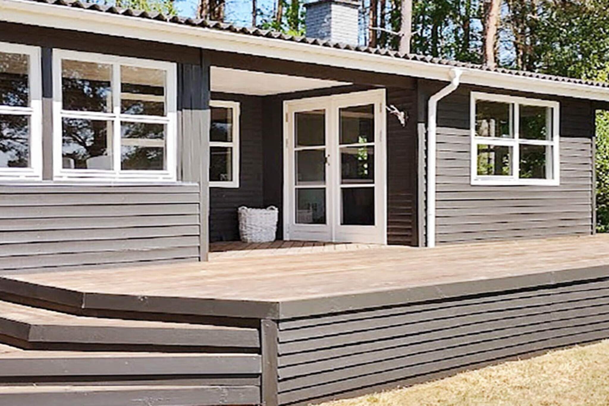 From the moment you arrive at this charming vacation home, you sense that it is a true labor of love. Situated on a beautiful natural plot of over 2,600 m² and surrounded by trees, the wooden house combines privacy and tranquility with a connection to nature. Originally built in 1971, the property has been continuously renovated, most recently in 2020, giving it a contemporary and comfortable feel while retaining its warm, personal character. The well-equipped kitchen opens onto the living room, where a cozy wood-burning stove adds warmth and atmosphere. Large windows throughout the house ensure plenty of natural light and offer views of the surrounding landscape, creating a bright and inviting interior. There are three small but comfortable bedrooms, each with a 140 cm wide double bed, while the third bedroom has two beds measuring 80 and 90 cm. The bathroom is equipped with a shower, washing machine, and dryer, providing practical amenities for a comfortable stay. Outside, a large covered terrace on the south side allows you to enjoy the outdoors in almost any weather. An elevated outdoor area provides stunning views of the surrounding green spaces, river meadows, and plantations, where you can observe local wildlife up close. Please note that the terrace is not fenced. Entertainment is available via Chromecast for streaming from your own providers, as there is no TV channel package. With its combination of charm, comfort, and scenic surroundings, this property offers an ideal setting for a peaceful and memorable getaway. Rental to youth groups is not permitted.A refundable deposit might be charged closer to your check-in date. The security deposit ensures a smooth stay and covers any additional services or consumption charges.This deposit covers utilities consumed during your stay and any additional services that may be taken.The final amount will be adjusted based on actual meter readings, actual usage of extra services, and any remaining balance will be refunded within 21 days after checkout.This deposit simply acts as a prepayment for charges that  you would anyways pay for, ensuring a seamless stay and check-out experience.