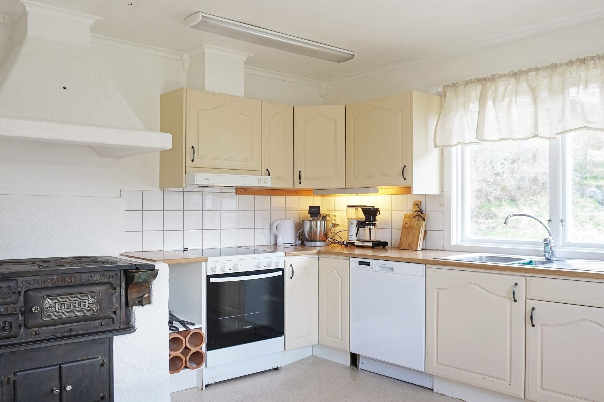 Welcome to this many-possibilities accommodation in a cottage that belongs to an old larger farm with a rich history that is now making a biodynamic journey. Here, in a calm and peaceful environment, you can take part in the farm's various activities such as courses in cooking, composting, visit the hen farm to pick your own breakfast eggs, pick cherries, apples or plums in season, or participate in wild boar hunting. It is also possible to order dinner from the owner of the farm. On neighboring KynnefjÃ¤ll there are plenty of both berries and mushrooms, and on the farm there is the opportunity to both freeze and dry what you have picked. In the area there are waterfalls worth visiting and the farm also has its own beach at the mile-long BullaresjÃ¶arna, by the beach there is a barbecue area and a wind shelter if you want to try sleeping in the open air. From the beach it is excellent to launch a canoe or kayak for your own fishing trips (fishing license required). For those who like nature experiences, there are plenty of hiking opportunities in untouched nature with rich wildlife, don't forget your camera! In the forests, both wild animals and birds roam and you might get the chance to catch a glimpse of a moose. Feel free to take a trip on the approximately 35-mile-long Bohusleden hiking trail that passes through the area. Via a staircase you come to the cabin's entrance and further into a welcoming hall which is the hub of the cabin, from where you reach the kitchen with stove, microwave, fridge/freezer, coffee maker and dishwasher, dining room with dining room furniture, living room with large cozy sofa bed and TV, bathroom with bathtub. From the hall a staircase leads up to the second floor with three bedrooms, two with double beds and one with bunk beds and a single bed, one of the bedrooms has its own balcony, a toilet is also on this floor. From the hall, a staircase leads down to the basement floor, where the cottage's laundry room with washing machine and dryer and a shower can be found. From the living room you reach the cottage's balcony area with summer furniture and barbecue, a place for pleasant moments and conversations as you review the day's events or plan for new ones. The cabin has a fiber connection. In the area there are various excursion destinations such as Ã„lgafallet, a magnificent waterfall with a height of 46 m, well worth a visit. The river above the falls forms the very border between Sweden and Norway. In Tanumshede there is a very well-visited world heritage area and a petroglyph museum. Take a trip across the border to Norway and Halden for a visit to Fredriksten's fortress or why not to StrÃ¶mstad, a city by the sea with a large selection of activities during the summer, rich restaurant life, pleasant shopping in small shops that are close to each other and do you feel like a salty, cooling dip in the summer heat, it's a short distance to the sea, rocks and swimming, feel free to take one of the bathing boats out to one of the islands in the StrÃ¶mstad archipelago. From StrÃ¶mstad, there is also a ferry to the Koster Islands, Sweden's westernmost islands with a resident population.