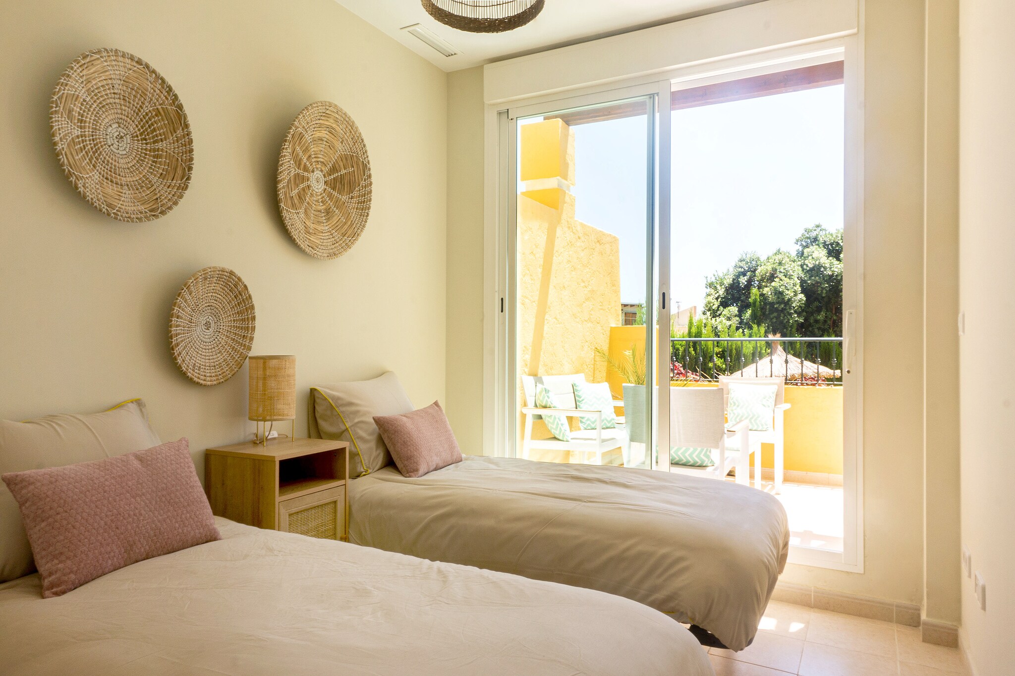 Ground floor: (hallway, Living room(TV, dining table, seating area, air conditioning), Kitchen(hob, electric kettle, toaster, coffee machine(cups), microwave, dishwasher, fridge, freezer), bedroom(double bed, garden doors, air conditioning), bedroom(single bed, single bed, garden doors, air conditioning), bathroom(bath tub, shower, washbasin, toilet, hairdryer), bathroom(shower, washbasin, toilet, hairdryer), toilet(toilet), pantry(washing machine))\n\nbalcony or terrace, terrace, garden, garden furniture, sun loungers, parking, swimming pool(shared with other guests), swimming pool(shared with other guests), lounge set