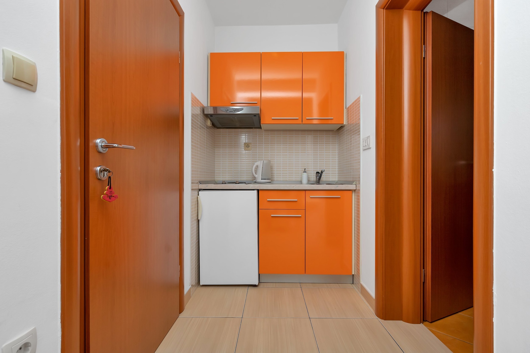 Apartments Villa Juric are located in a small town called Baška Voda, only 12 km from Makarska. 

Common BBQ grill as well as an outdoor dining area are at your disposal. All the units have a private furnished balcony.

Free private parking is provided, reservation is not needed.

Luggage storage is possible prior to check in and after check out, so you can explore the city a little more before your departure. 

A baby cot is available upon request.

This studio apartment can accommodate up to four people. It features air-conditioning as well as LCD TV. Kitchenette is equipped with refrigerator, water kettle, freezer, coffee maker, kitchen utensils and dining area. The private bathroom comes with a shower and toilet. Bed linen and towels are provided.

This location is perfect for guests who love to enjoy the sun and the sea, want to  avoid the crowds, enjoy the peace and keep the privacy. Due to the properties good location everything you may need during your holiday can be found in the area. Restaurants and bars  can be found within 100 m radius from the property. Beach is only 400 m from Apartments Villa Juric. Market is situated only 100 m from the property.

Split airport is 24 km from the property, while bus station for local buses is only 70 m away.