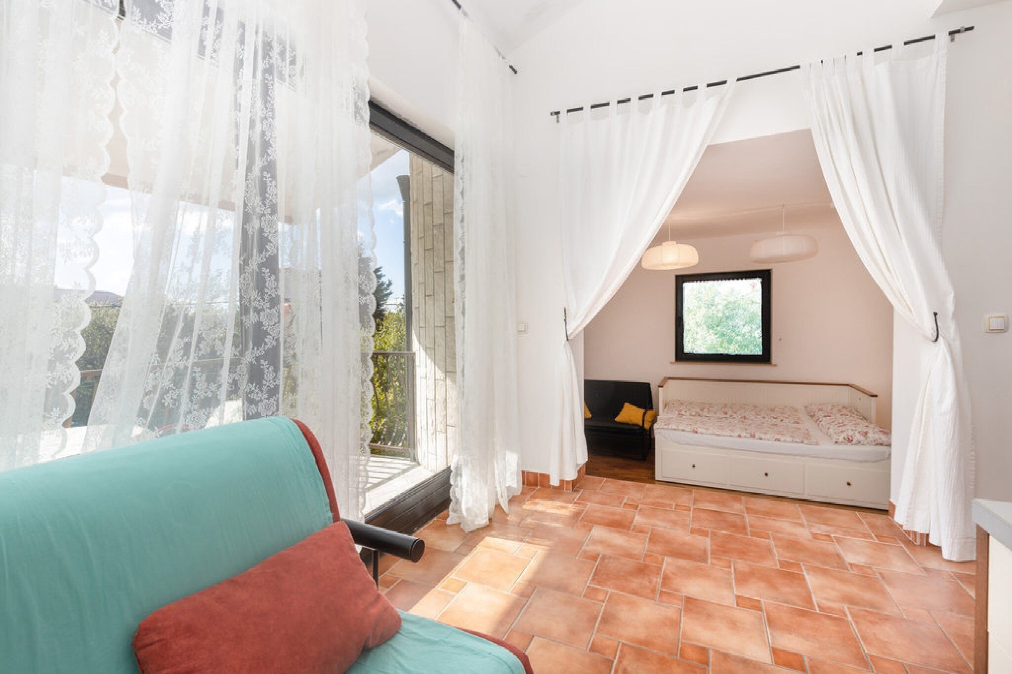 Apartments Ilija Njavro are located in a small coastal town Jadranovo, in the northern coast of Croatia. 

 A shared BBQ grill as well as an outdoor dining area are at your disposal. All the units come with a private terrace or balcony. The free Wi-fi is available throughout the property. 

Private parking is provided, reservation is not needed. 

Towels are provided on the request.

This studio apartment with balcony can accommodate up to two people. It features LCD SAT TV. The kitchen is equipped with refrigerator, freezer, trash cans, stove, coffee maker, kitchen utensils as well as dining area. The private bathroom comes with a shower and toilet. Bed linen is provided.

This location is perfect for guests who love to enjoy the sun and the sea, being close to the touristic center, but far enough to avoid the crowds and keep their peace and privacy. The beach is only 200 m from Apartments Ilija Njavro. Restaurants, bars as well as supermarket can be found within 300 m from the property.

Rijeka airport is 25 km from the property.