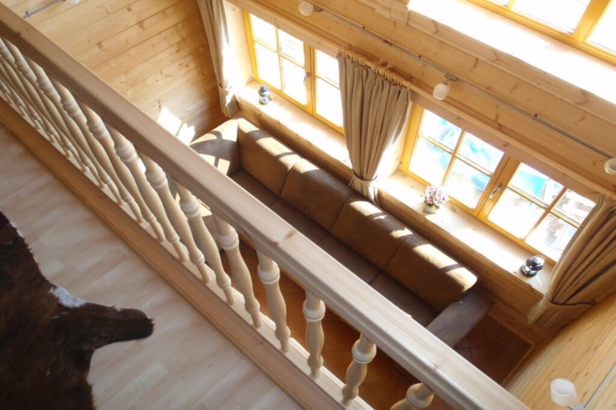 Ground floor: (Living room(fireplace, seating area), open kitchen(dining table, electric kettle, cooker(gas), coffee machine(filter, pads), oven, combination microwave, dishwasher, fridge), bedroom(single bed, single bed), bathroom(bath tub, shower(walk-in shower), washbasin, toilet, hairdryer), toilet(washbasin))\n\nOn the 1st floor: (bedroom(double bed(boxspring)), bedroom(double bed(boxspring)), bedroom(single bed(boxspring), single bed(boxspring)), bathroom(shower, washbasin, toilet))\n\nski storage, tumble dryer, cot, sauna, washing machine, terrace, garden, garden furniture, BBQ, 4x parking, high chair