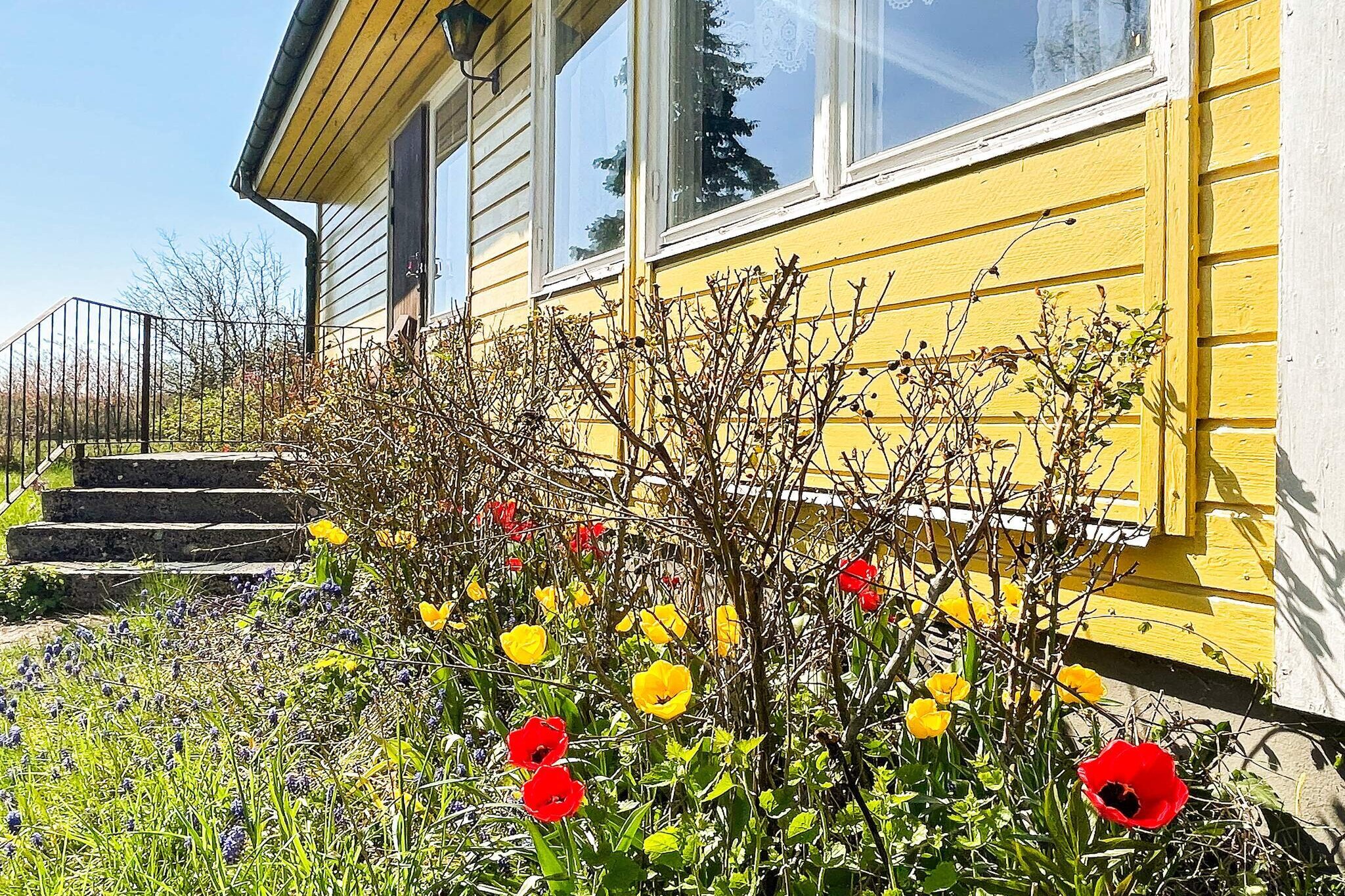 Kitchen(cooker(electric), hood, coffee machine, microwave, freezer(1-59L), fridge-freezer, water from well), Living/bed room(single bed, TV), bedroom(single bed, double bed), bedroom(2x single bed), bathroom(washbasin, shower, toilet, washing machine), heating(electric), garden furniture, parking