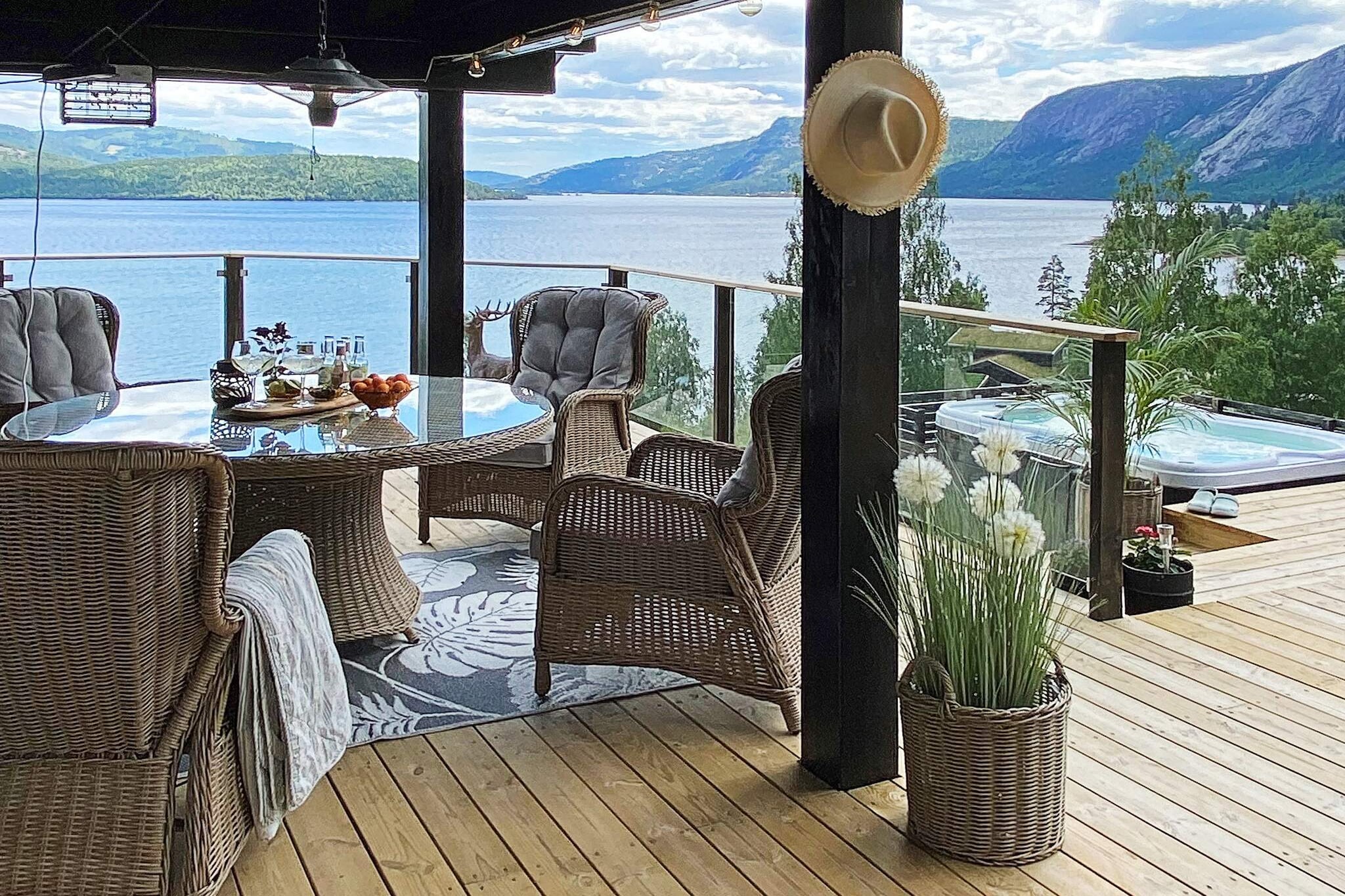 Annex(15 m2): (double bed)\n\nInternet Access DSL, open kitchen(cooker(electric), hood, coffee machine(filter), waffle iron, microwave, dishwasher, fridge, freezer(1-59L), tumble dryer, washing machine), Living/bed room(50 m2)(double folding bed, TV(norvegian TV channels ), fireplace), bedroom(double bed), bedroom(double bed), bedroom(double bed), bathroom(bathtub or shower, washbasin, toilet), bathroom(floor heating)(bathtub or shower, washbasin, toilet), bathroom(floor heating)(bathtub or shower, washbasin, toilet), Bubble bath(outside, 4 persons), heating(electric), terrace(75 m2), terrace(roofed, 50 m2), garden furniture, BBQ, parking