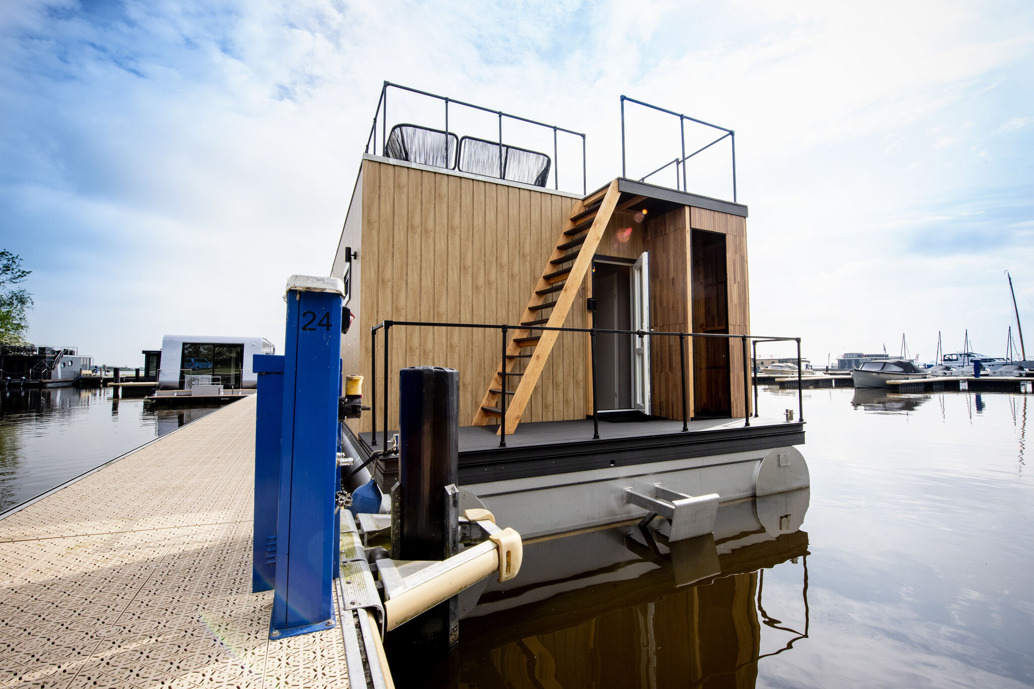 Modern houseboat with view of the Lake