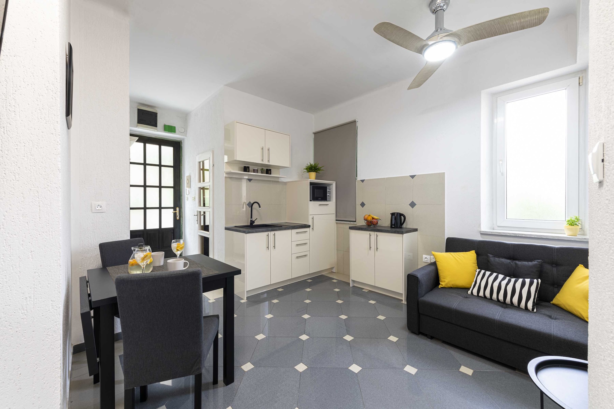 Apartment Iva is sitauted in a quite popular part of Dubrovnik. 

A shared terrace as well as common BBQ grill and an outdoor dining area are at your disposal. Apartment Iva offers accommodation with a private balcony. 

Luggage storage is possible prior to check in and after check out, so you can explore the city a little more before your departure.

Kindly note: Parking is not available.

This one bedroom apartment with balcony is a perfect fit for two people. It features air-conditioning, free Wi-fi as well as Internet enabled LCD TV. The open space living room comes with sofa and sitting area, and it's combined with the equipped kitchen and dining area. The private bathroom comes with shower and toilet.
Free toiletries, hair dryer as well as linens and towels are at your disposal.

The part of the town, where this apartment is located, is very popular because everything you may need is near the accommodation and guests can reach Old Town in less then 5 minutes drive or 20 minutes walk. Grocery store, bus station, bars and cafes can be found in 200 meters range, as well as bakeries and ATMs. Nearest beach is just 400 m from the apartment.

Dubrovnik Bus Station and Ferry Port, connecting the mainland with various Dalmatian islands, are 5 minutes ride from the apartment, while Dubrovnik Airport is 21 km away.