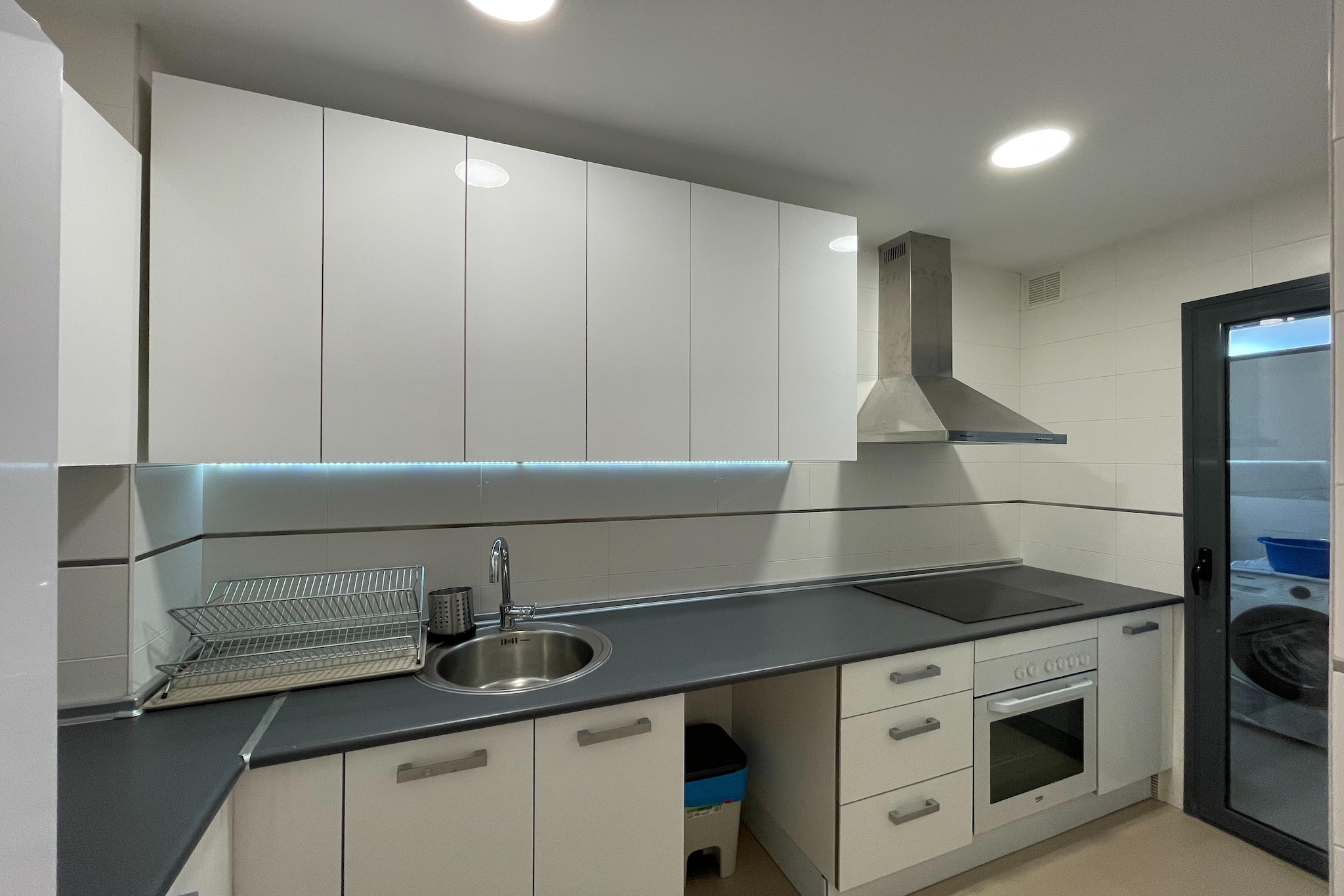 Ground floor: (Entrance(shared with other guests, reachable from the outside), lift)\n\nOn the 3rd floor: (Entrance, Living room(TV(flatscreen), dining table, seating area), Kitchen(hob, toaster, hood, coffee machine, oven, microwave, fridge-freezer), bedroom(double bed), bedroom(single bed, single bed), bathroom(shower, washbasin, toilet), washing room(washing machine, ironing board, iron), air conditioning, terrace(private, 14 m2), air to air heatpump)\n\nfitness room(fitness equipment(shared with other guests)), garden(shared with other guests), BBQ(shared with other guests), parking lot(public), swimming pool(shared with other guests, outside, opened from May upto and including Sep), swimming pool(shared with other guests, indoor, opened from Jan upto and including Dec), tennis court(shared with other guests), padel court