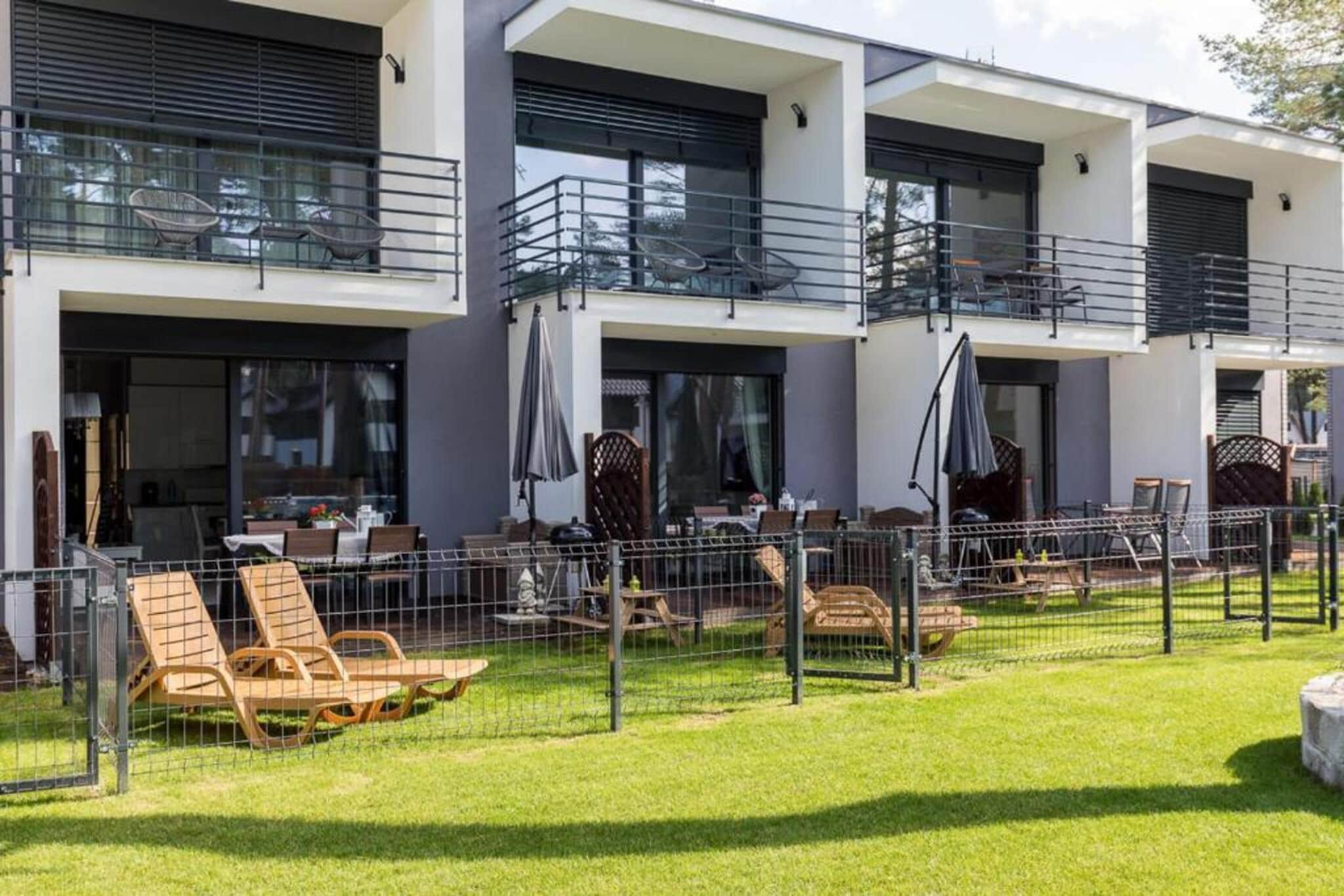 Domy szeregowe z dostępem do basenu Pobierowo-Buitenkant zomer