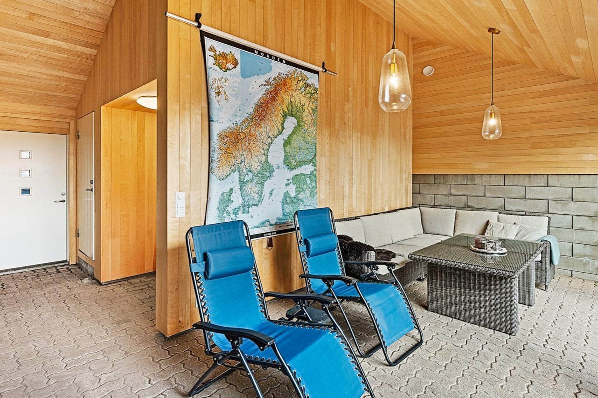 Annex(15 m2): \n\nLiving room(single folding bed), open kitchen(floor heating)(cooker(electric), hood, coffee machine(filter), waffle iron, dishwasher, fridge, washing machine, high chair), Living/bed room(floor heating, 25 m2)(TV(cable, norvegian TV channels ), radio, radio), bedroom(double bed), bedroom(3x bunk bed), bedroom(double bed), bedroom(double bed), bathroom(washbasin, shower, toilet), bathroom(bathtub or shower, washbasin, toilet), heating(electric), terrace(150 m2), terrace(roofed, 7 m2), garden furniture, BBQ, fish cleaning table