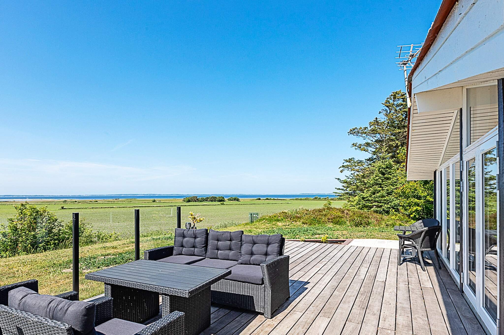 Kitchen(cooker(2 ring stoves), coffee machine, oven, dishwasher, fridge, freezer(60-99L), fridge-freezer), Living/bed room(TV, chromecast), bedroom(single bed, 2x bunk bed), bedroom(double bed), bedroom(double bed), bathroom(washbasin, shower, toilet, washing machine), heating(electric), terrace, garden furniture, sun loungers, play equipment, air to air heatpump