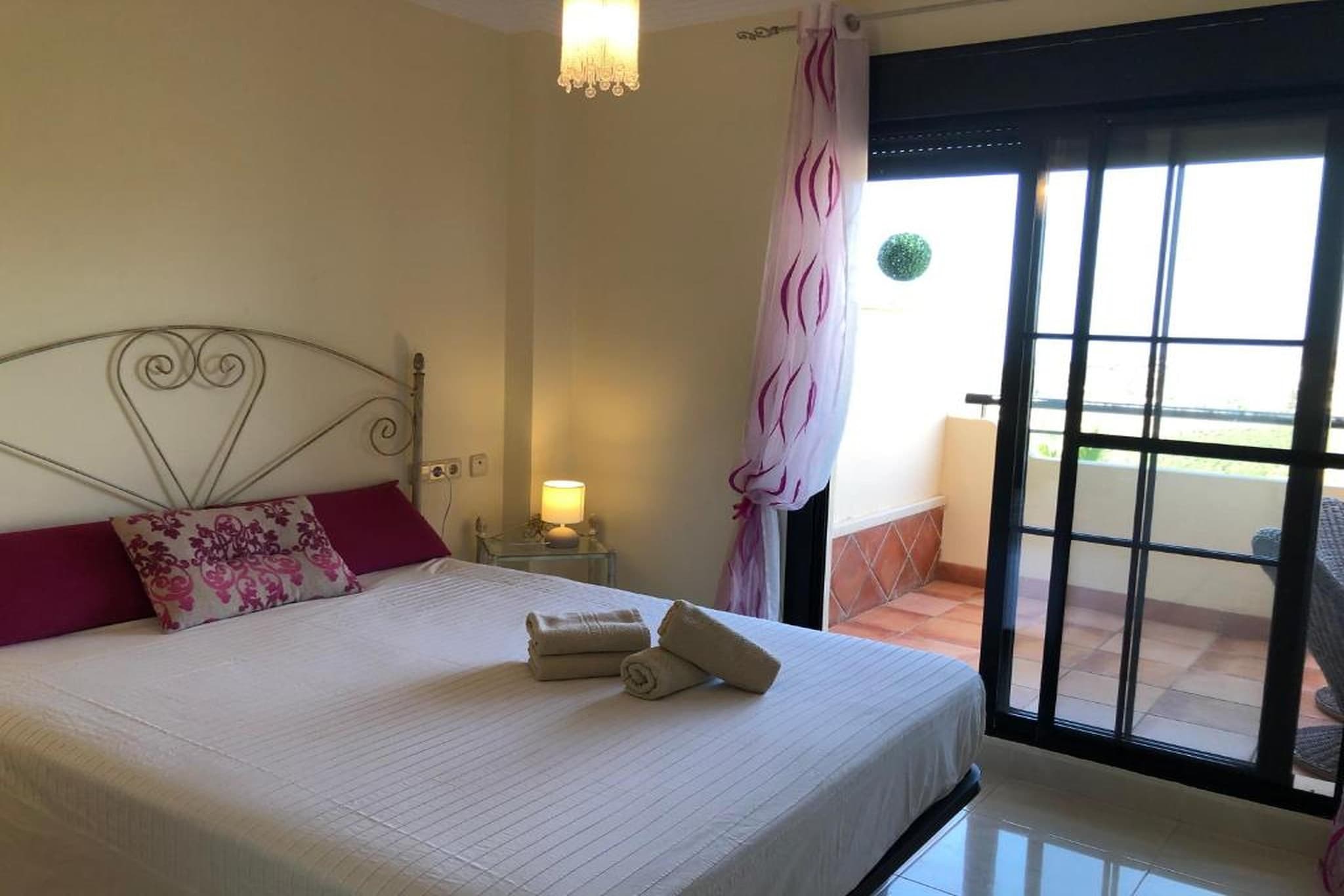 Ground floor: (Living room(TV, seating area), Kitchen(cooker, microwave, fridge-freezer), bedroom(double bed), bedroom(single bed, single bed), bathroom(shower), bathroom(bath tub))\n\nair conditioning, garden, parking, swimming pool(shared with other guests)