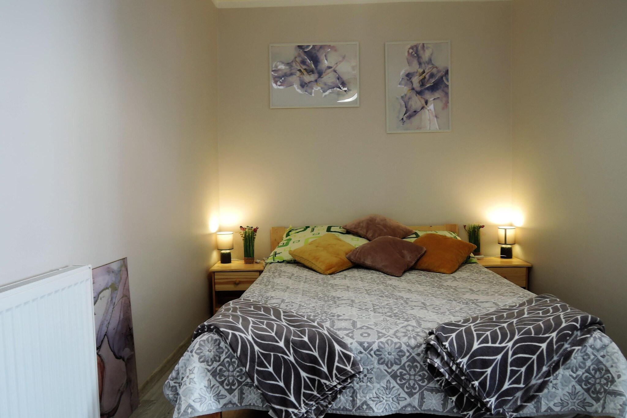 An apartment in DziwnÃ³w at Aleja Sportu and only 100 meters from the beautiful, wide beach on the Baltic Sea. The Avenue is a unique place. It contains almost 100 replicas of medals and trophies won by Polish athletes during the biggest sports events and competitions. The pedestals look the best in the evening, when they are illuminated, which makes them unique and splendid.

DziwnÃ³w is a small, charming seaside town, beautifully situated on a promontory between the Baltic Sea and the Dziwna River.
One of the biggest attractions of DziwnÃ³w is the drawbridge built on the Dziwna Strait, which connects Wolin Island with the mainland. The bridge rises several times a day, accompanied by the passage of ships.
Another attraction is the promenade, which is almost 3 km long and is located at the top of the coastal dunes. It is an ideal walking place for families with children and the elderly, stretching between pine forests.
DziwnÃ³w, as a seaside town, could not function without ports. Everyone who visits this place should therefore go to the yacht port, fishing port and to the seasonal marina and mooring of cruise ships. The yacht harbor is built in the shape of the letter "G" and accommodates about 60 vessels up to 12 m in length. Yachts participating in regatta competitions of the world or European championships moor here many times.
5 km from DziwnÃ³w there is the Baltic Dinosaur Park with a wonderful Safari Park, and an almost 30-kilometre bicycle route runs along the Dziwna river. Also noteworthy is KamieÅ„ Pomorski with its fascinating 14th-century architecture and TrzÄ™sacz with historically interesting church ruins. DziwnÃ³w and its surroundings are a truly unique, picturesque place where everyone will surely find something for themselves.