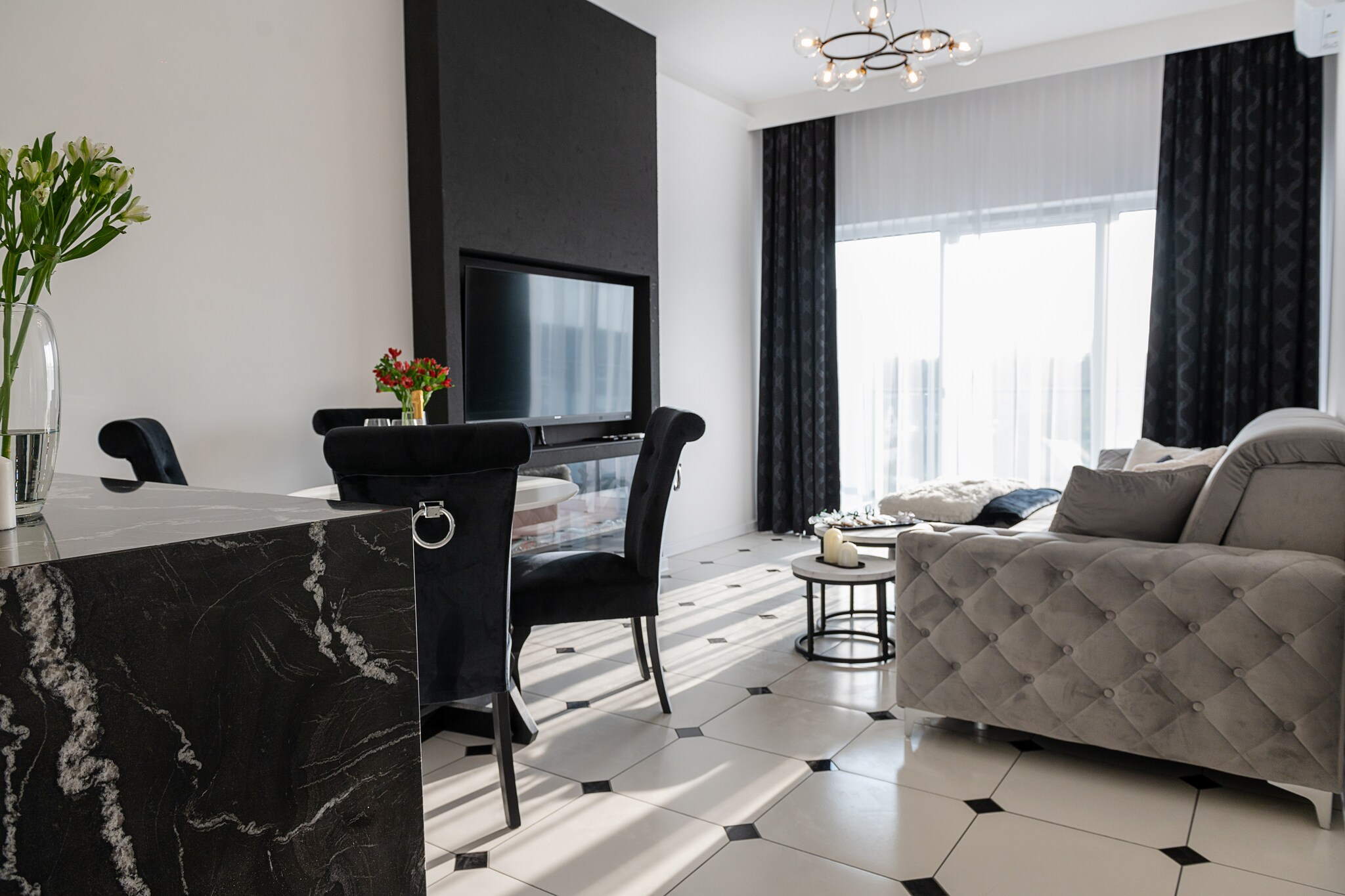 On the 3rd floor: (open kitchen(hob(4 ring stoves, induction), electric kettle, toaster, coffee machine, oven, microwave, dishwasher, fridge-freezer, washing machine), Living/diningroom(double sofa bed, TV(flatscreen), dining table, decorative fireplace), bedroom(double bed, TV(flatscreen)), bathroom(shower, washbasin, toilet, hairdryer))\n\nInternet access, Parking, Whirlpool, Massage, Fitness, Play area, sauna(shared with other guests), balcony, heating(central, through air conditioning), air conditioning, garden furniture, sun loungers, swimming pool(shared with other guests, heatable, indoor, including separate children’s swimming pool (depth 50cm)), sand pit(shared with other guests), slide(shared with other guests), lift, ironing board, iron, Swing set