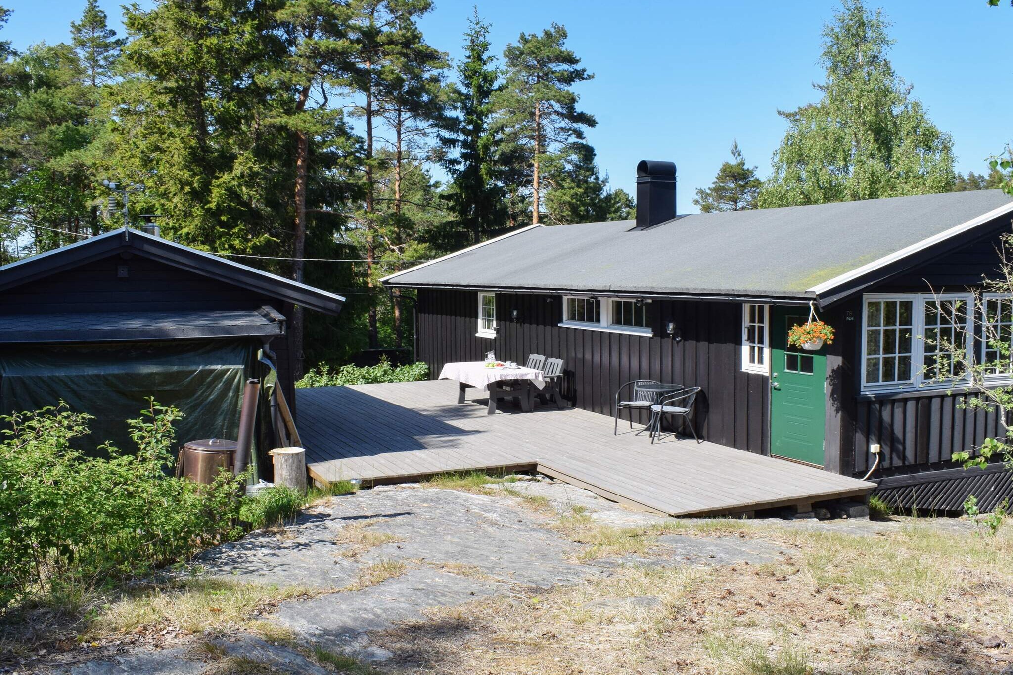 Pleasant holiday home at Buerskogen in Halden located in fantastic nature and with a beach within walking distance. The cabin contains a hallway, large living room with sofa corner and dining room. Nice wood-burning stove and fireplace in the living room. There is a TV in the living room, no channels but DVD and movies available. Kitchen with small dining area, dishwasher, and kitchen equipment. One bedroom with a double bed and one with a bunk bed, in addition there is a bedroom with a single bed and access to the bathroom. This room has a roller blind that can be pulled down by the bed to make it more unobtrusive when others walk to the bathroom. The bathroom is newly refurbished with a toilet, sink, and shower cubicle, underfloor heating. Large terrace with garden furniture and barbecue. Great hiking opportunities in the area. The cabin is located a few minutes from the lake Ørsjøen with three beaches. The main beach is below Buerskogen camping with piers and a raft, the campsite has a playground with trampolines. Here, you can catch trout, pike, trench, and perch. Lots of blueberries in the area and a rich wildlife with birds, squirrels, and deer. The holiday house is not far from Halden with everything a small town has to offer and where a visit to Fredriksten fortress is recommended. A short drive to Sweden for shopping. Note that there is a 250 meters walk from the car park to the holiday house, the owner has a trolley in the car park which can be used for luggage. The cabin is not let to youth groups. 2025: Wifi is NOK 550,- per week. Holiday house 48442 is 250 m away and 48917 450 m away.
