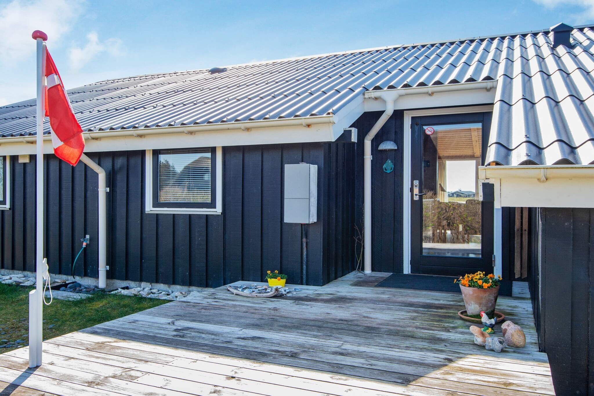 Kitchen(cooker(electric), coffee machine, microwave, dishwasher, fridge, freezer(1-59L), fridge-freezer), Living/bed room(TV(german television channels, danish TV channels (DR1 and TV2), norvegian TV channels , swedish TV channels), chromecast), bedroom(double bed), bedroom(double bed), bedroom(2x single bed), bedroom(2x bunk bed), bathroom(washbasin, shower, toilet), bathroom(tumble dryer, washbasin, shower, toilet, washing machine), mezzanine(single folding bed), Bubble bath(indoor, heated, 2 persons), sauna(indoor, 4 persons), heating(electric), terrace, garden furniture, sun loungers, play equipment, air to air heatpump