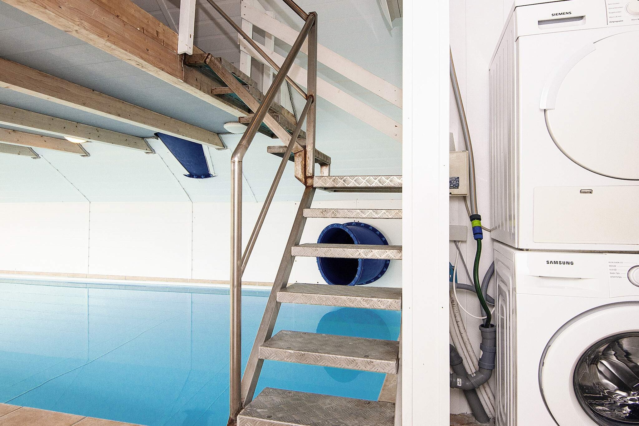 Internet Access DSL, Living room(TV(german television channels, danish TV channels (DR1 and TV2)), DVD player), Living room(4x single folding bed), Kitchen(cooker(2 ring stoves), coffee machine, oven, microwave, dishwasher, fridge, freezer(100-139L), high chair), bedroom(double bed), bedroom(double bed, cot), bedroom(double bed), bedroom(double bed), bathroom(washbasin, shower, toilet), bathroom(washbasin, shower, toilet), bathroom(washbasin, shower, toilet), bathroom(washbasin, toilet), Bubble bath(outside, heated, 5 persons), sauna(indoor, 6 persons), heating(central), terrace, garden furniture, deckchairs, swimming pool(indoor), play equipment, air to water heatpump