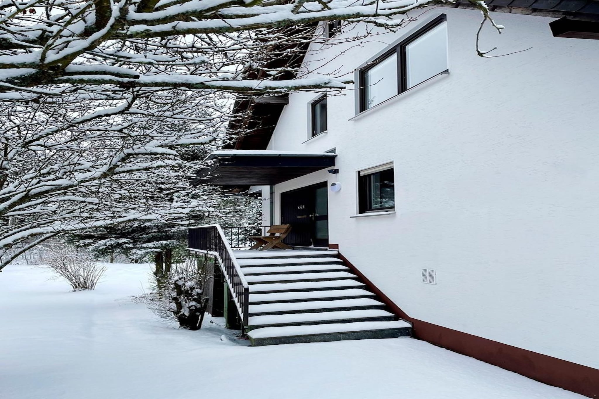 On the 2nd floor: (Kitchen(electric kettle, toaster, cooker(ceramic), coffee machine(cups, filter, pads), oven, microwave, dishwasher, fridge, freezer), Living/diningroom(TV, dining table, seating area), bedroom(double bed, bunk bed), bedroom(double bed), bathroom(shower, washbasin, toilet, hairdryer), Landing)\n\ntumble dryer, cot, washing machine, balcony, garden(shared with other guests), garden furniture, BBQ, 2x parking, high chair