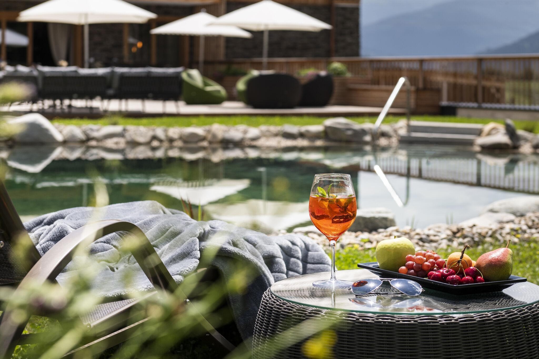 Ground floor: (Living room(TV, seating area), Kitchen(cooker(4 ring stoves, ceramic), coffee machine(cups), oven, dishwasher, fridge-freezer, washbasin), bedroom(bunk bed, bunk bed), bedroom(double bed), bedroom(double bed), bathroom(shower, washbasin), bathroom(shower), bathroom(washbasin, toilet), bathroom(washbasin, toilet), bathroom(shower, washbasin), bathroom(shower, washbasin))\n\nsauna, terrace, garden, BBQ, parking, swimming pool(private, natural swimming pond)