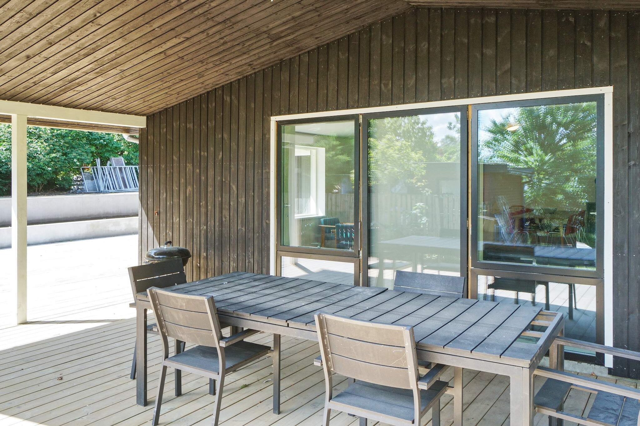 Attractive, newly built in 2023, this holiday home offers 135 m² of living space and can accommodate up to 8 guests. It is located in a popular holiday area with very child-friendly beaches within easy reach, making it ideal for families seeking both relaxation and fun. The house features a spacious, open-plan kitchen and living area with a dining space and cozy seating for family gatherings. The room has a vaulted ceiling up to the ridge and large panoramic windows that fill the space with natural light. From here, you have direct access to a beautiful and very large terrace, perfect for enjoying meals, sunshine, and the peaceful surroundings. There are four bedrooms in the house, each with a double bed, providing comfortable sleeping arrangements for all guests. In addition, there are two modern bathrooms with underfloor heating, adding to the comfort and convenience of your stay. The well-equipped kitchen makes meal preparation easy, and the living area offers a relaxing space to unwind together. Outside, the terrace invites you to fire up the grill, enjoy the sun, or simply soak in the tranquility. The home is an excellent base for exploring Northern Zealand and its many attractions, from scenic coastal walks to charming towns and cultural sites. Families and groups will appreciate the thoughtful layout, modern amenities, and the proximity to safe, sandy beaches. No rental to youth groups.A refundable deposit might be charged closer to your check-in date. The security deposit ensures a smooth stay and covers any additional services or consumption charges.This deposit covers utilities consumed during your stay and any additional services that may be taken.The final amount will be adjusted based on actual meter readings, actual usage of extra services, and any remaining balance will be refunded within 21 days after checkout.This deposit simply acts as a prepayment for charges that you would anyways pay for, ensuring a seamless stay and check-out experience.