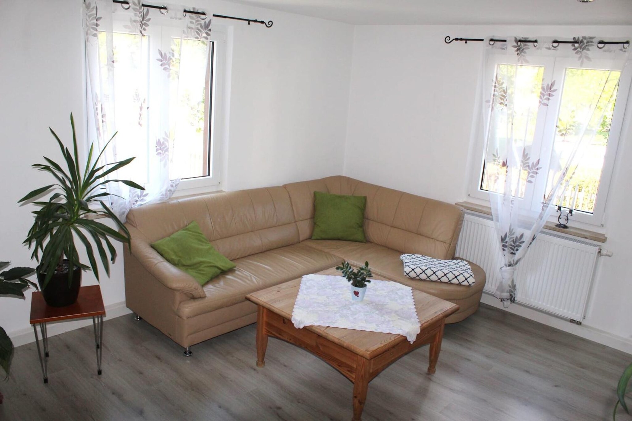 Located in the quiet village of Lichtenhain, near Sebnitz, this charming ground-floor apartment offers a relaxing stay for 2 guests. Ideal for couples or solo travelers, the home features a double bedroom, a modern bathroom with shower, washbasin, toilet, and hairdryer, and a cozy living room with satellite TV, radio, and a comfortable seating area.

The fully equipped kitchen includes a ceramic 4-ring stove, oven, microwave, dishwasher, fridge, toaster, electric kettle, and both cup and filter coffee machinesâ€”perfect for leisurely mornings. A dining table completes the space, and gas heating ensures comfort in all seasons.

Step outside to enjoy a private 20 mÂ² terrace with deckchairs, parasol, and sunscreen, plus access to a shared 700 mÂ² garden with charcoal barbecue (on request) and garden furniture. Parking is available on-site.

With shops, restaurants, and public transport all within walking distance, and forest trails, ski slopes, and indoor pools nearby, this home is a peaceful base for exploring Saxon Switzerland.