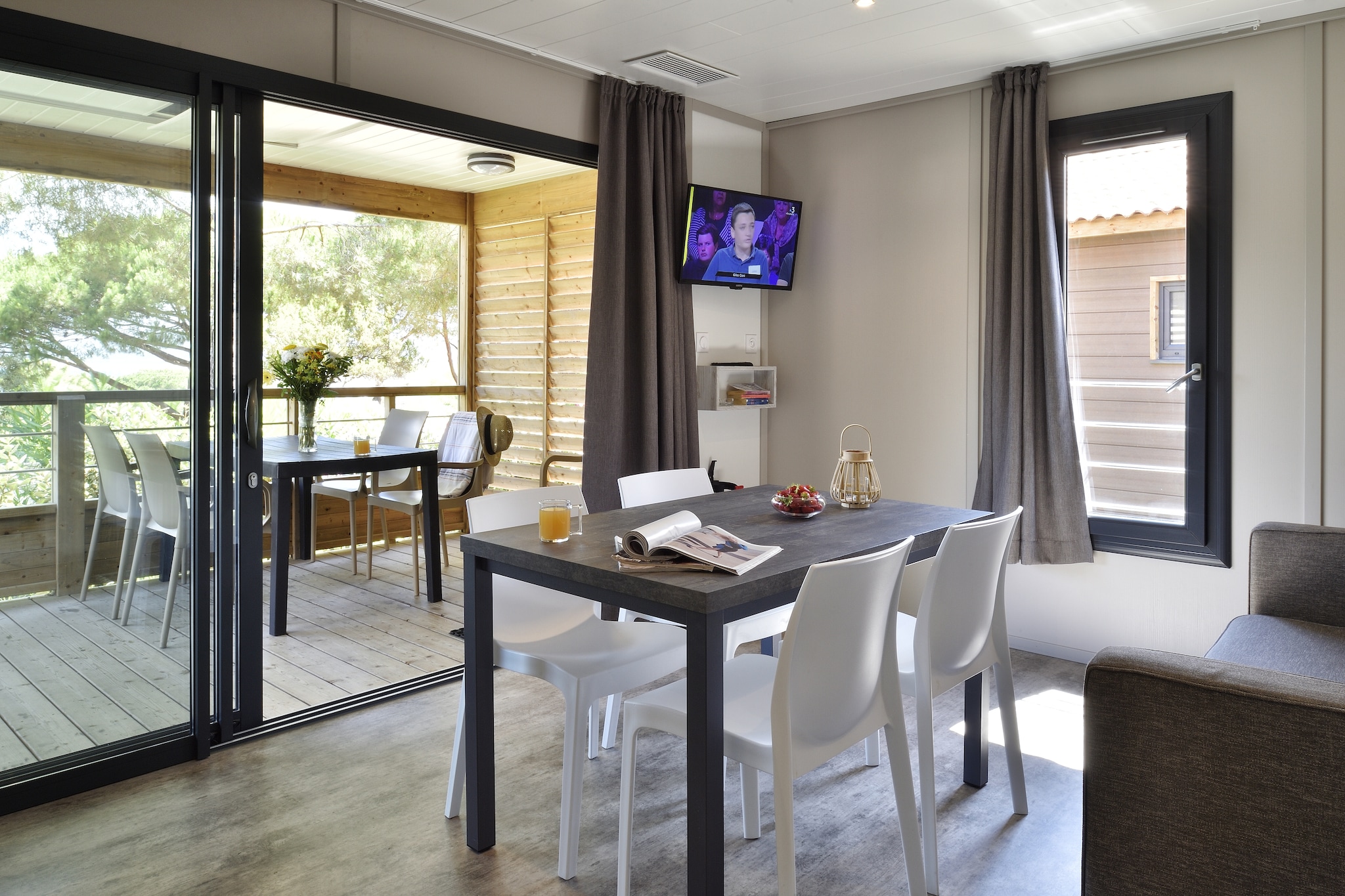 Thinking beach days, cocktail sunsets and shared memories - that’s what U Livanti promises. Planted in a green 6-hectare park with direct access to the bay, this holiday residence blends nature, sea and simplicity in real Corsican style.

The house comes with all the essentials: air-conditioning, wifi, a paid laundry area, free parking and more. Indoors - comprise a spacious living room with TV, a fully equipped kitchen flowing into the dining area, or if you want outdoor meals, hop on to the balcony, a shared full bathroom and two bedrooms furnished with a double bed and three single beds, respectively. Great for small groups or couples traveling together, giving just enough privacy and comfort with modest luxury.

If you and your crew want action, go for a day of paddle-boarding or snorkelling, rent a boat, try wind-surfing or dive into water sports. On land, rental bikes are available to ride towards the coast or discover local villages for tavern lunches and seaside ice cream.

As the day turns evening, walk the garden with music or head out for dinner by the coast. With the sea just footsteps away and hills and villages nearby, you get the freedom to do as much or as little as you please. Perfect for families or friends who want sun, surf and a chilled-out base to explore when the mood strikes.