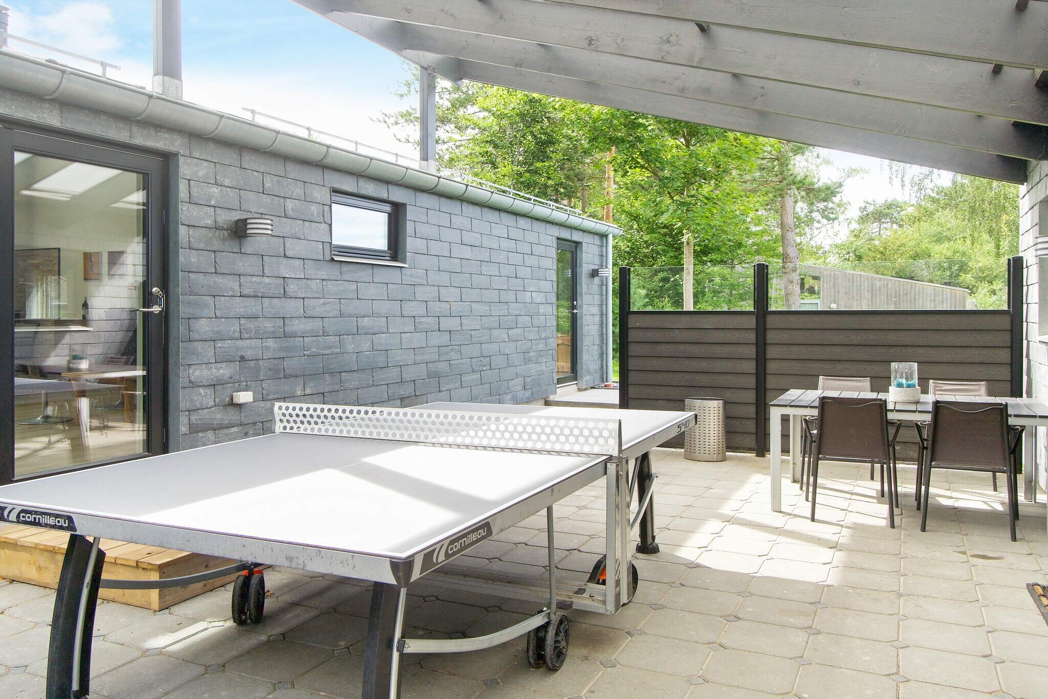 Annex: (double bed, TV, coffee machine, fridge, washbasin, shower, toilet)\n\nKitchen(coffee machine, oven, microwave, fridge-freezer), Living/bed room(TV), bedroom(double bed), bedroom(double bed), bedroom(double bed), bathroom(washbasin, shower, toilet), bathroom(washbasin, shower, toilet), mezzanine, bath tub(outside, heated, 8 persons), balcony or terrace, terrace, garden, garden furniture, air to water heatpump