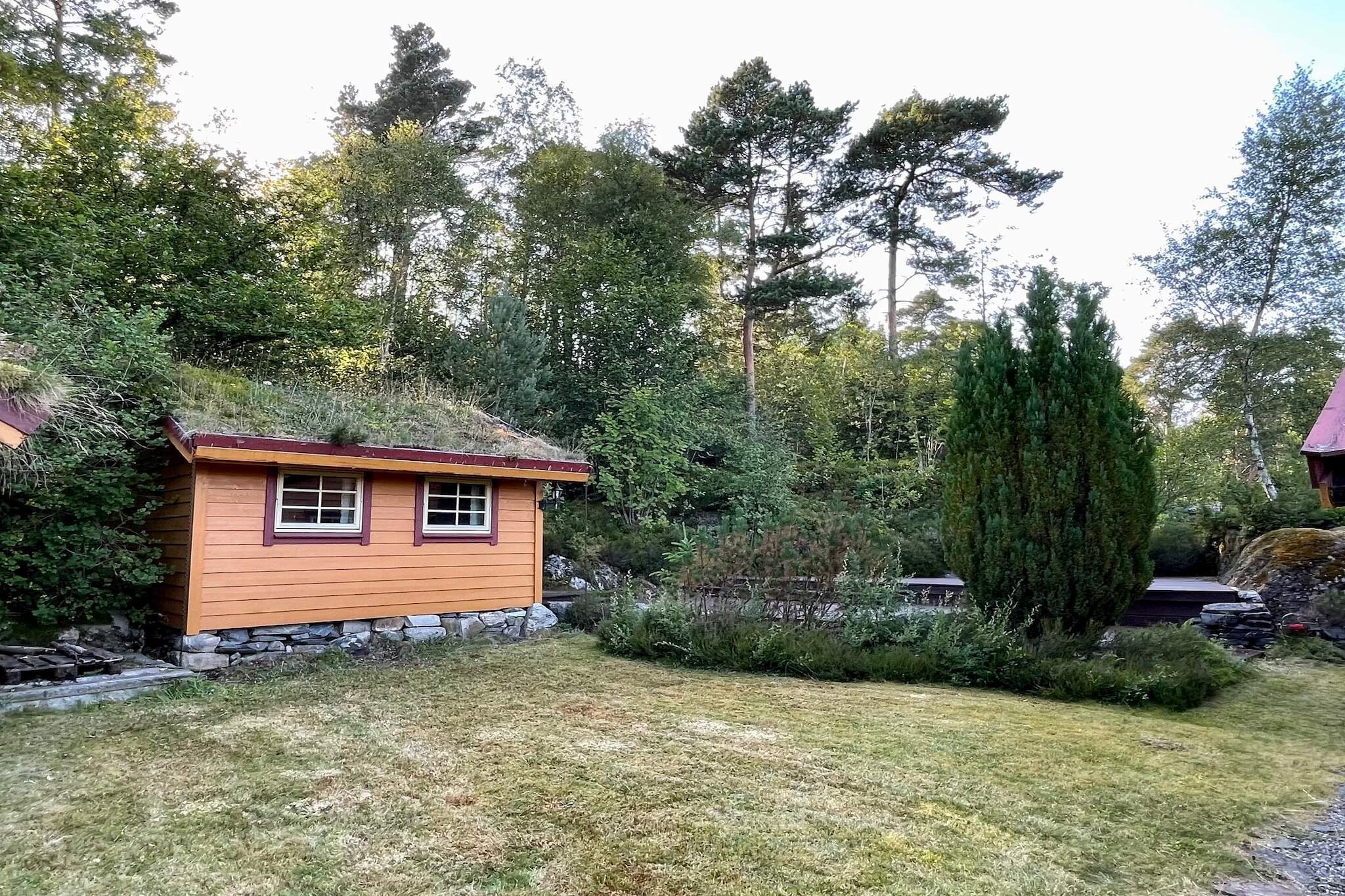 Annex(15 m2): (single bed, double bed)\n\nopen kitchen(cooker(electric), hood, coffee machine(filter), waffle iron, dishwasher, fridge, freezer(200-249L), washing machine, high chair), Living/bed room(35 m2)(TV(german television channels), radio), bedroom(double bed), bedroom(2x bunk bed), bedroom(2x bunk bed), bathroom(floor heating)(bathtub or shower, washbasin, toilet), bathroom(floor heating)(bathtub or shower, washbasin, toilet), heating(electric), terrace(60 m2), garden furniture, BBQ, parking