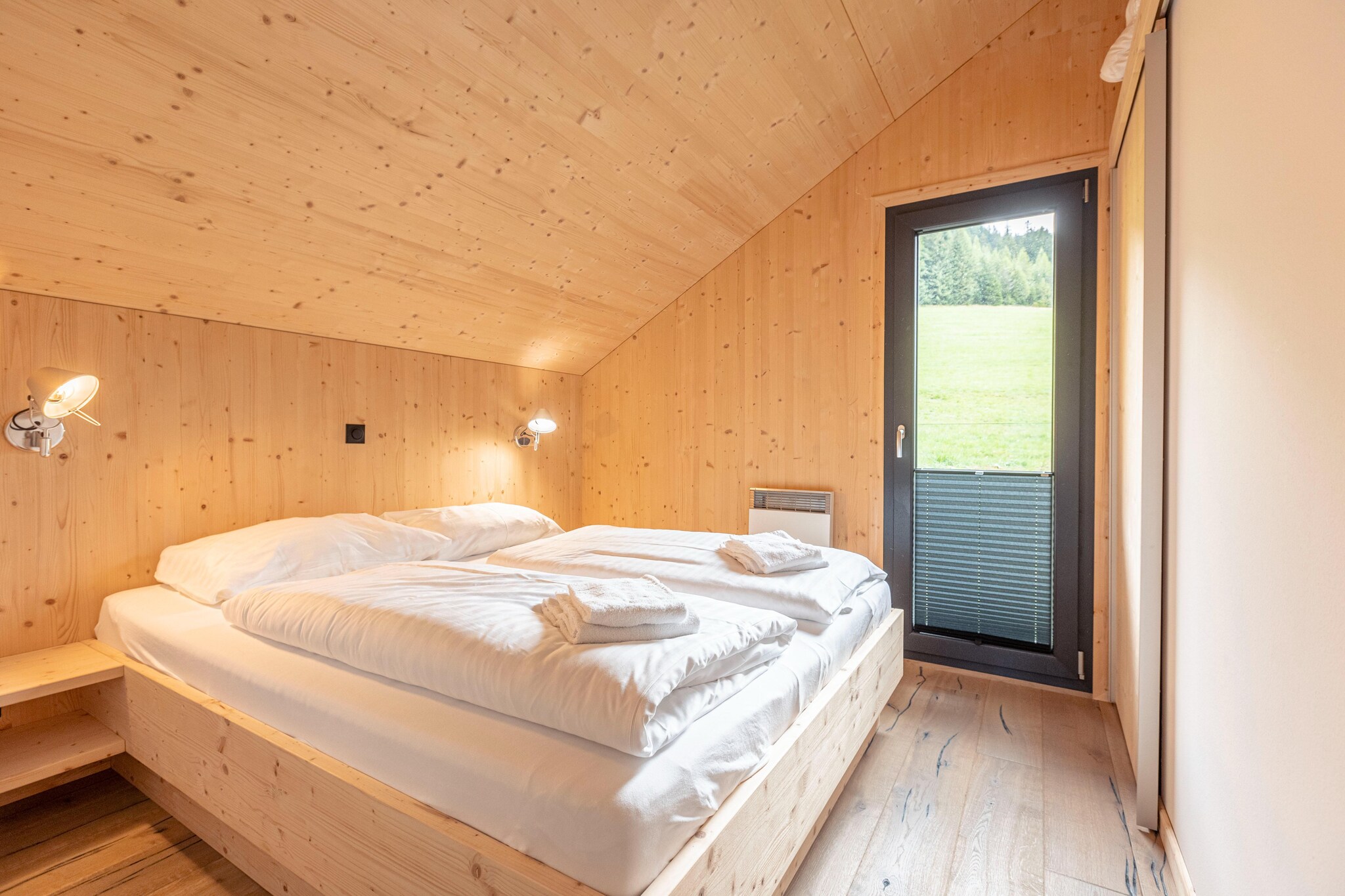 Ground floor: (Entrance, Living room(TV(satellite), dining table, seating area), open kitchen(hob(4 ring stoves, ceramic), electric kettle, toaster, coffee machine(filter), oven, microwave, dishwasher, fridge-freezer), Internet access, balcony or terrace)\n\nOn the 1st floor: (bedroom(double bed), bedroom(double bed), bedroom(double bed), bathroom(shower, infrared sauna, toilet))\n\nTV(cable), garden furniture, parking, parking