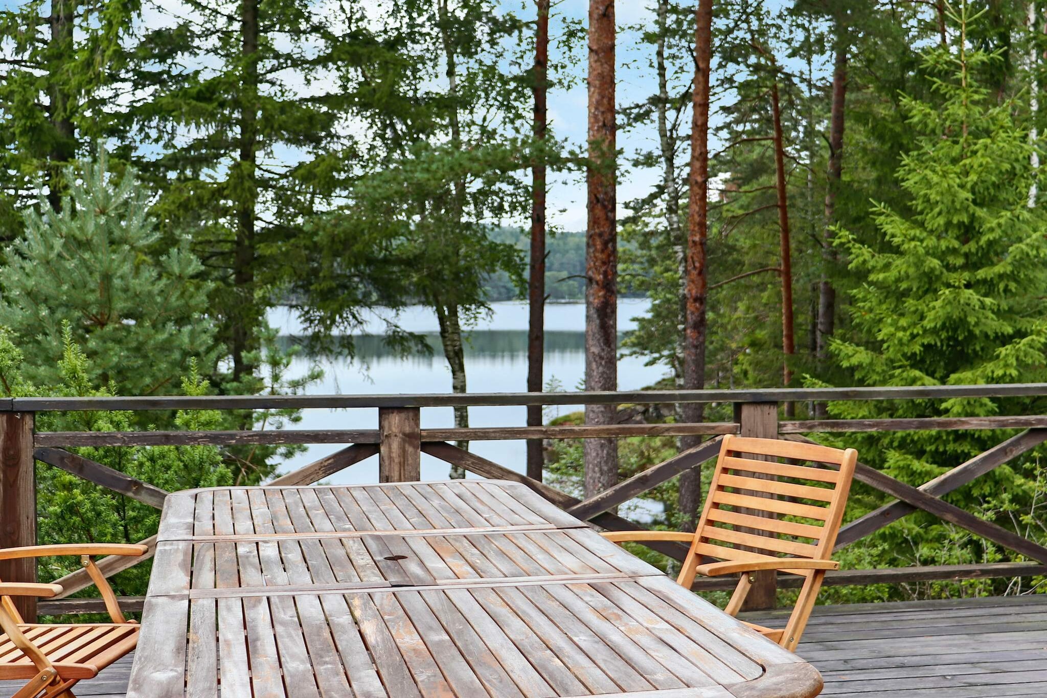 Right at the lake's edge is this lovely summer house. From the large balcony you look out over untouched nature and part of the small lake. Down by the water is your rowing boat. Maybe you'll be lucky and catch something for your barbecue dinner. Everything is quiet and still around the cabin. A gem for all nature lovers. The entrance is from the spacious balcony. From the hall you have two bedrooms on the left. One with a double bed and one with two single beds that can be put together to make one bed. The bathroom has a shower cabin. The kitchen, which has everything you need for your meals, has a dining area. The heart of the house is a large open living room with a dining area and a lovely wood-burning stove. From the outer part of the living room there are large windows and an exit to the balcony's wooden deck. The natural site slopes down towards the lake and around the cottage there is untouched forest. A short walk from the house is a small swimming area. The nearest place is SÃ¤tila and here you can find all services and a larger public bathing area. In SÃ¤tila there is also a steamboat that runs tours in the large lake Lyngern. In the vicinity of the cabin there is also a very special nature reserve with the Rammhultafallet, a mighty waterfall that cascades into Lyngern. The area has a unique nature consisting of forests, mountains and lakes. Here you live close to several attractions such as TjolÃ¶holm Castle, A short drive from the cottage is the village of Ã„skhult, a living cultural heritage. There is also a lovely cafÃ© here. FjÃ¤rÃ¥s BrÃ¤cka is a mighty ice ridge formation that rises 60 meters above sea level. A fantastic view, walks, swimming and fishing attract here. Visit the Li burial ground, Halland's largest, with over 100 tombstones from the Iron Age. At the Naturum, which is open all year round, you can see an exhibition about the formation of FjÃ¤rÃ¥s BrÃ¤kka and the popular cafÃ© serves home-baked, organic and locally grown food. Also visit Kungsbacka and Hede Fashion Outlet. For those interested in fishing, there are several lakes in the area that offer good fishing. Fishing license required. For those interested in golf, ForsgÃ¥rden's golf club is the closest. Welcome!