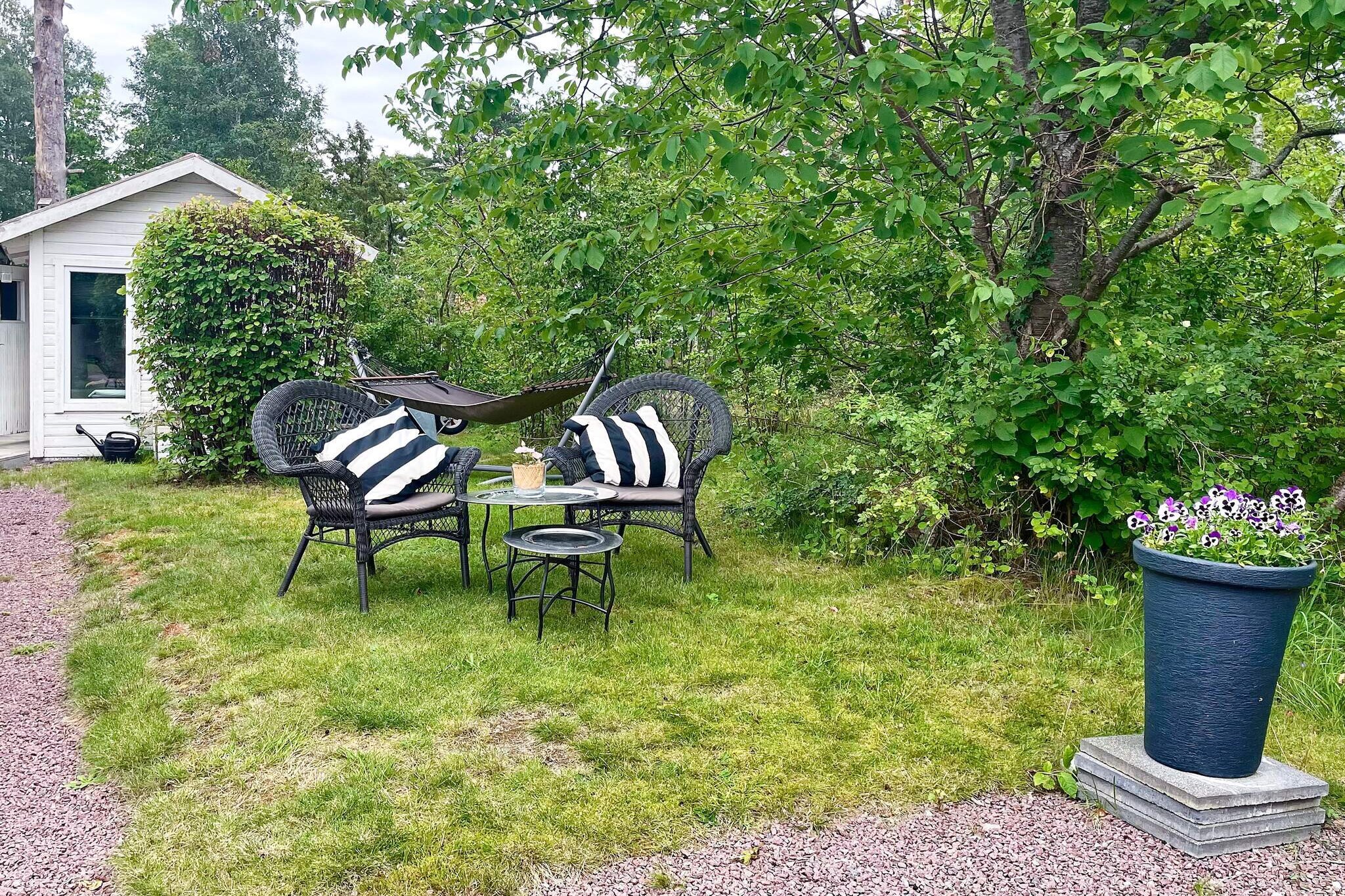 Wonderfully decorated house with associated guest cottage on the nice holiday island Oknö where you can enjoy the sea view and the proximity to cooling dips. You have a large lovely garden with a nice patio deck with outdoor furniture and barbecue. You can enjoy late into the evening in the large glazed conservatory, where you have dining room furniture and a living area with a comfortable sofa to lean back in. In the fine kitchen you can enjoy preparing your meals. There is a dishwasher, dining area and most things you may need. In the beautifully decorated living room you can enjoy in front of the TV or a good book if desired. In the main house there are two bedrooms. One with a comfortable double bed, the other with a comfortable sofa bed. In the nice guest cottage that is reached via the patio deck there is a 140cm wide double bed. Fresh bathroom with toilet, sink, shower, washing machine and dryer is in the large house. The island of Oknö is a lovely holiday idyll that you reach via a short car bridge. The location offers nice swimming opportunities with bathing places and walking paths in nice nature around the island. You have only 300m to the nearest bathing place where you can swim from the sandy beachor the piers. A children's playground is also available. You have only 600m to Oknö camping where there is a swimming area and playground. In summer there is also a restaurant, boat, bicycle and pedal car rental as well as a small grocerystore with freshly baked bread. Bathing area with diving tower is right by the bridge that leads over to Oknö. There is also a nice Vass Oknö Krog. Nearby Mönsterås offers shops, restaurants and cafés in a cosy environment. For children, Mönsterås Vattenpalats is usually popular. Enjoy a day trip to Öland or Kalmar. You are not allowed to use the fireplaces, neither inside nor outside. Smoking is not allowed