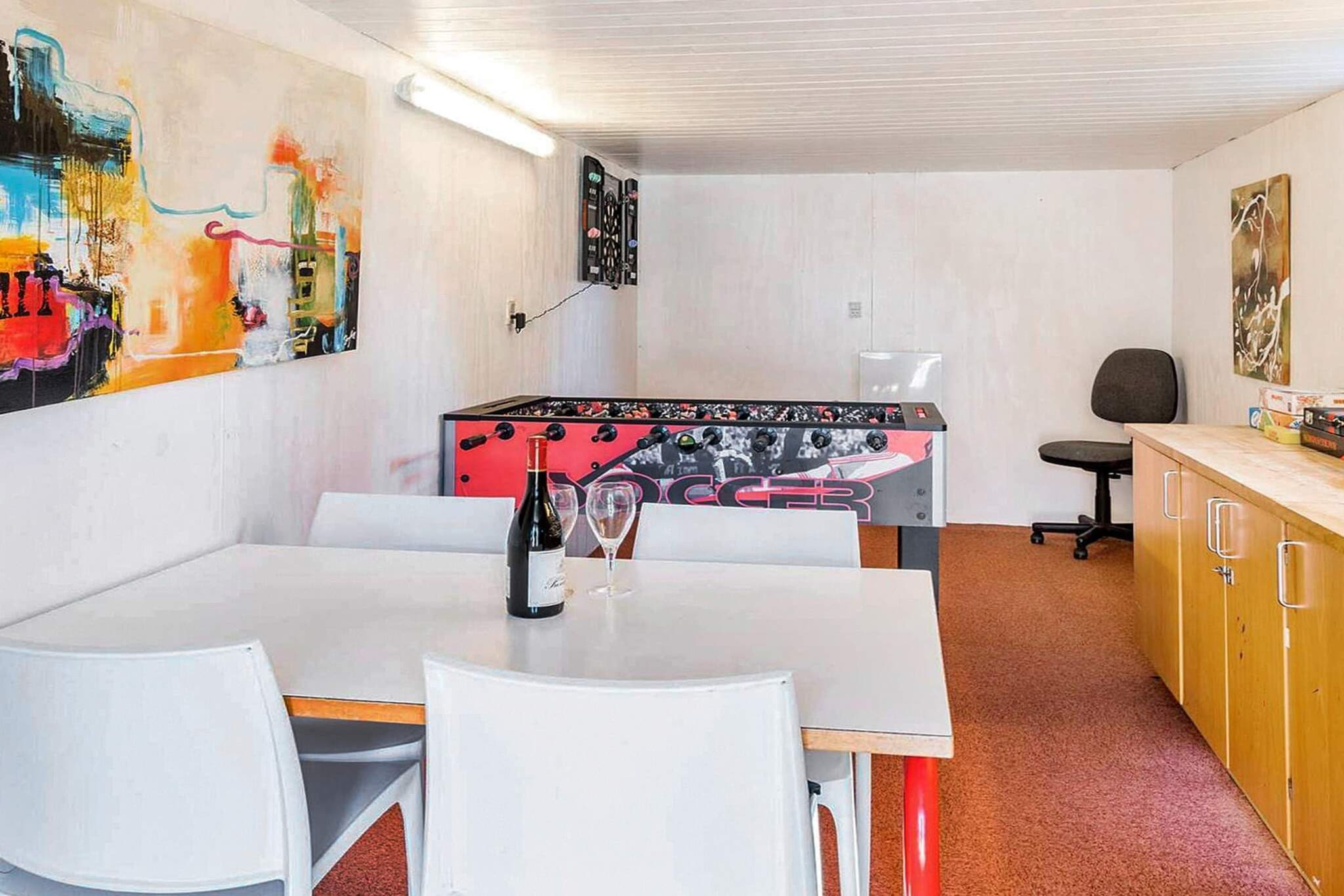 Internet Access DSL, Kitchen(stove(induction), coffee machine, microwave, dishwasher, fridge(+ freezer)), Living/bed room(TV(german television channels, danish TV channels (DR1 and TV2)), DVD player, stereo unit), bedroom(double bed), bedroom(double bed), bedroom(double bed), bedroom(double bed), bedroom(2x bunk bed), bathroom(washbasin, shower, toilet), bathroom(tumble dryer, washbasin, shower, toilet, washing machine), fridge(+ freezer), Bubble bath(indoor, heated, 5 persons), sauna(indoor, 4 persons), heating(electric), terrace, garden furniture, swimming pool(indoor), play equipment, table football, darts