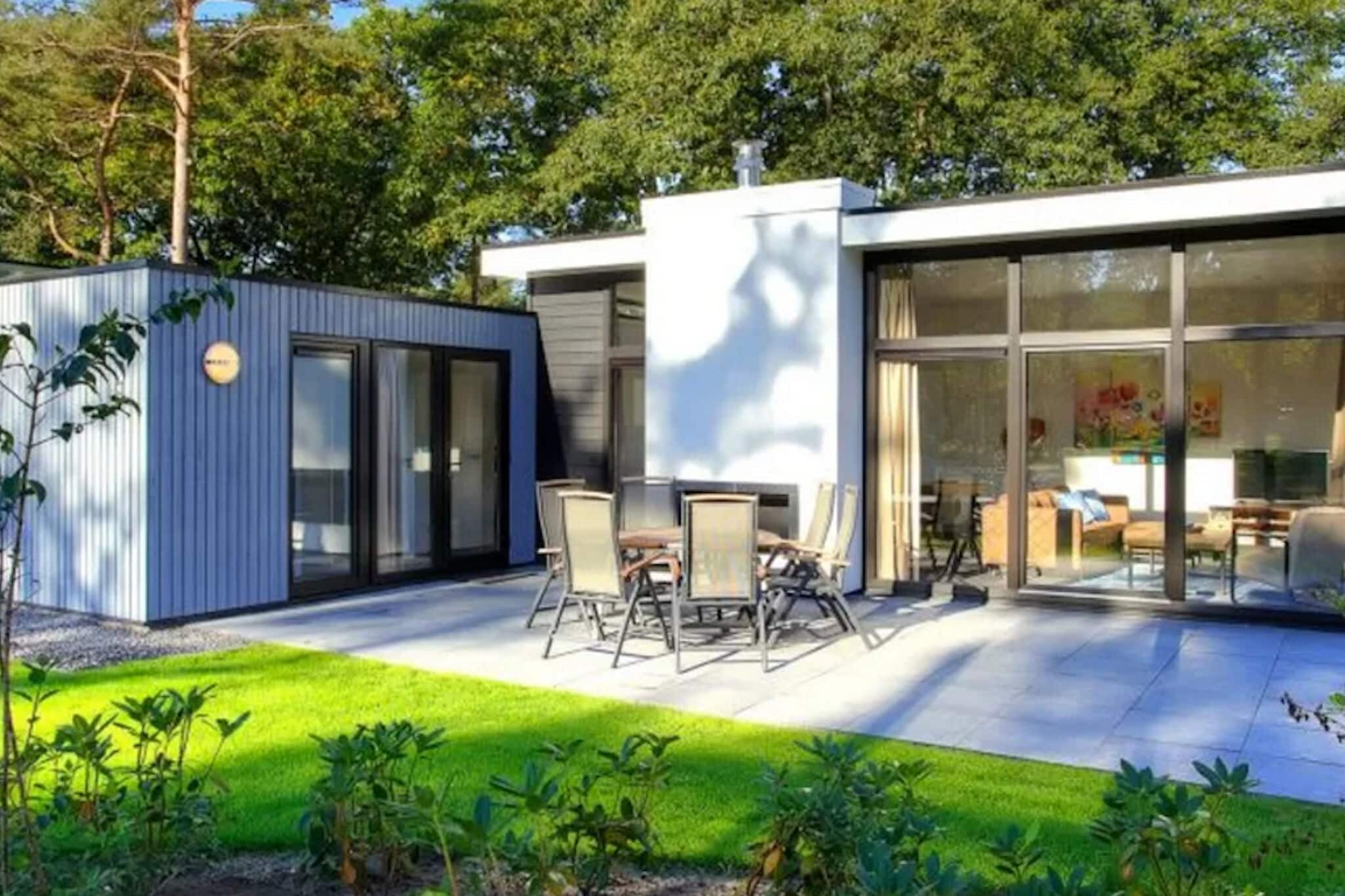 Modern holiday home with a decorative fireplace, on the Veluwe