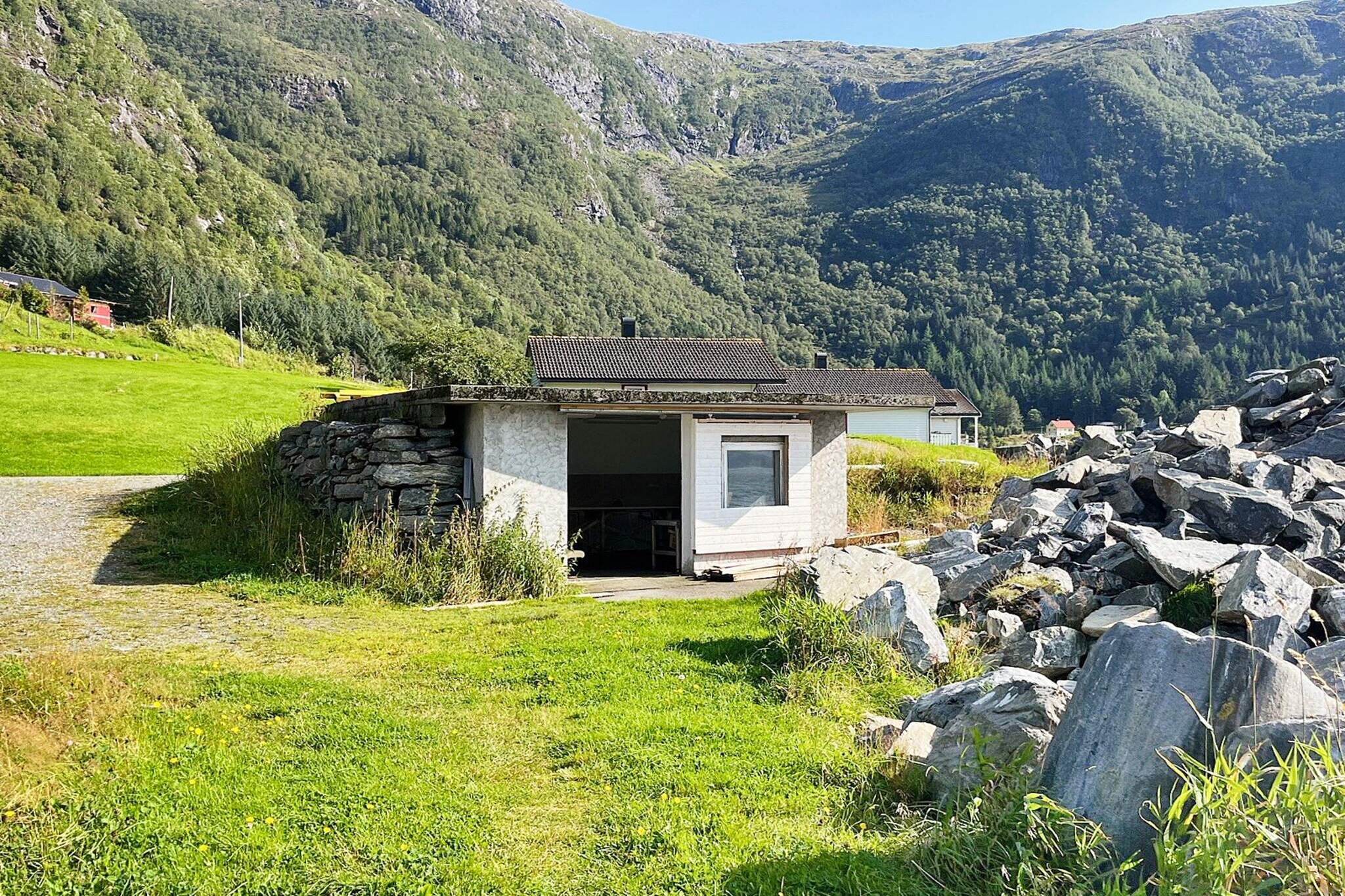 open kitchen(cooker(electric), hood, coffee machine(filter), microwave, dishwasher, fridge, freezer(200-249L), washing machine, high chair), Living/bed room(20 m2)(TV(satellite, german television channels)), bedroom(2x single bed), bedroom(2x single bed), bathroom(floor heating)(bathtub or shower, washbasin, toilet), heating(electric), terrace(roofed, 10 m2), garden furniture, BBQ, parking