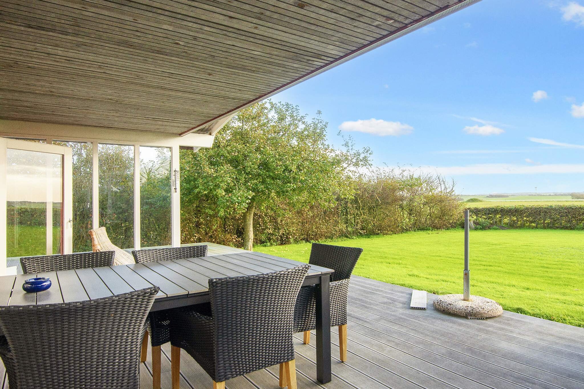 Internet Access DSL, Kitchen(cooker(2 ring stoves), coffee machine, oven, microwave, fridge, freezer(60-99L)), Living/bed room(TV(danish TV channels (DR1 and TV2)), chromecast), bedroom(double bed, high chair), bedroom(double bed), bedroom(2x bunk bed), bathroom(washbasin, shower, toilet, washing machine), heating(electric), terrace, garden furniture, deckchairs, play equipment, air to air heatpump