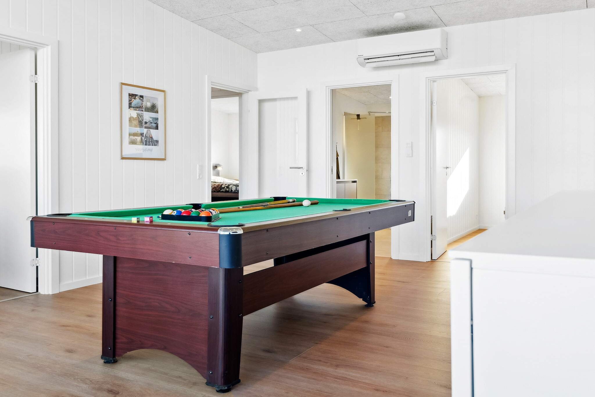 Internet Access DSL, Kitchen(stove(2 ring stoves), coffee machine, oven, microwave, dishwasher, fridge, freezer(60-99L)), Living/bed room(TV(german television channels)), bedroom(double bed), bedroom(double bed), bedroom(double bed), bedroom(double bed), bathroom(tumble dryer, washbasin, shower, toilet, washing machine), bathroom(washbasin, shower, toilet), outdoor shower(outside), Bubble bath(outside, heated, 6 persons), sauna(indoor, 4 persons), heating(electric), terrace, garden furniture, deckchairs, table tennis table, billiards, air to air heatpump