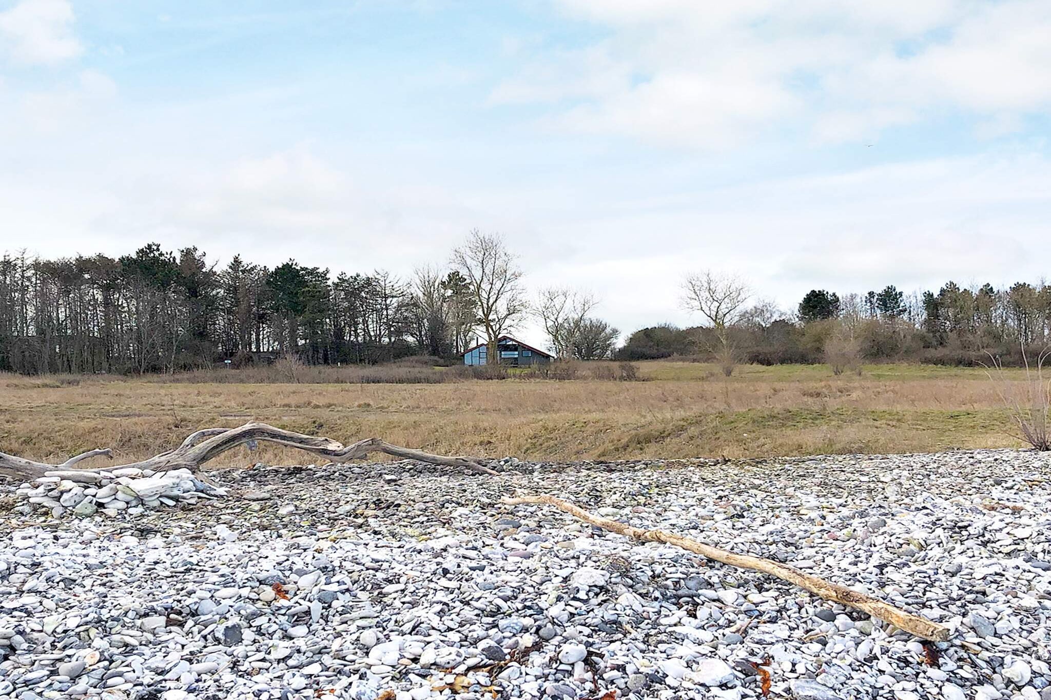 This charming traditional holiday home enjoys a unique location with breathtaking views of the Kattegat Sea, set on a generous 10,000 mÂ² plot. The property offers a perfect blend of privacy, nature, and coastal charm, making it an ideal retreat for those looking to relax and unwind by the water. Inside, the 57 mÂ² home features two cozy bedrooms, a bright open-plan kitchen and living area, and a bathroom with a shower. The living space is designed for comfort and functionality, providing a welcoming setting to spend time with family or friends. Large windows fill the interior with natural light while offering uninterrupted sea views, letting you enjoy the scenery from the comfort of indoors. The house also features terraces on both sides, including a covered terrace with magnificent sea views. Here, you can enjoy meals outdoors, watch the sun rise or set over the water, or simply listen to the soothing sound of the wavesâ€”a true coastal experience. Set within a vast private plot, the home offers ample space to stroll around, soak up the tranquil surroundings, and embrace the peaceful atmosphere. Its small size and excellent location make it an ideal getaway for couples, small families, or anyone looking for a relaxing coastal retreat. Please note: rental to youth groups is not permitted.A refundable deposit might be charged closer to your check-in date. TheÂ securityÂ depositÂ ensuresÂ aÂ smoothÂ stayÂ andÂ coversÂ any additionalÂ servicesÂ orÂ consumptionÂ charges.ThisÂ depositÂ coversÂ utilitiesÂ consumedÂ duringÂ yourÂ stay andÂ anyÂ additionalÂ servicesÂ thatÂ mayÂ beÂ taken.TheÂ finalÂ amountÂ willÂ beÂ adjustedÂ basedÂ onÂ actualÂ meter readings,Â actualÂ usageÂ ofÂ extraÂ services,Â andÂ anyÂ remaining balanceÂ willÂ beÂ refundedÂ withinÂ 21Â daysÂ afterÂ checkout.ThisÂ depositÂ simplyÂ actsÂ asÂ aÂ prepaymentÂ forÂ chargesÂ that Â youÂ wouldÂ anywaysÂ payÂ for,Â ensuringÂ aÂ seamlessÂ stayÂ and check-outÂ experience.