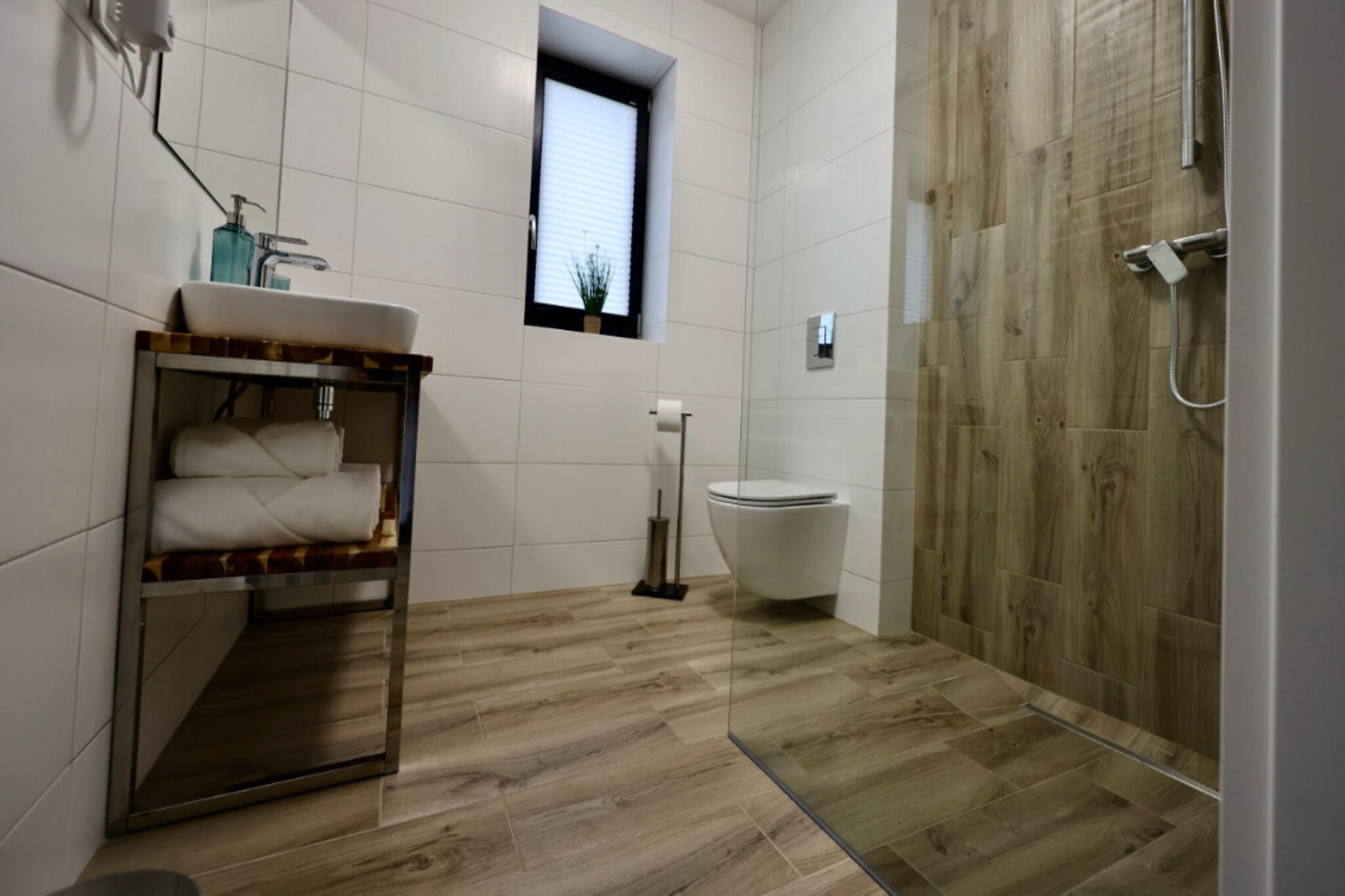 Połowa domu wakacyjnego przy plaży w Stepnicy-Badezimmer
